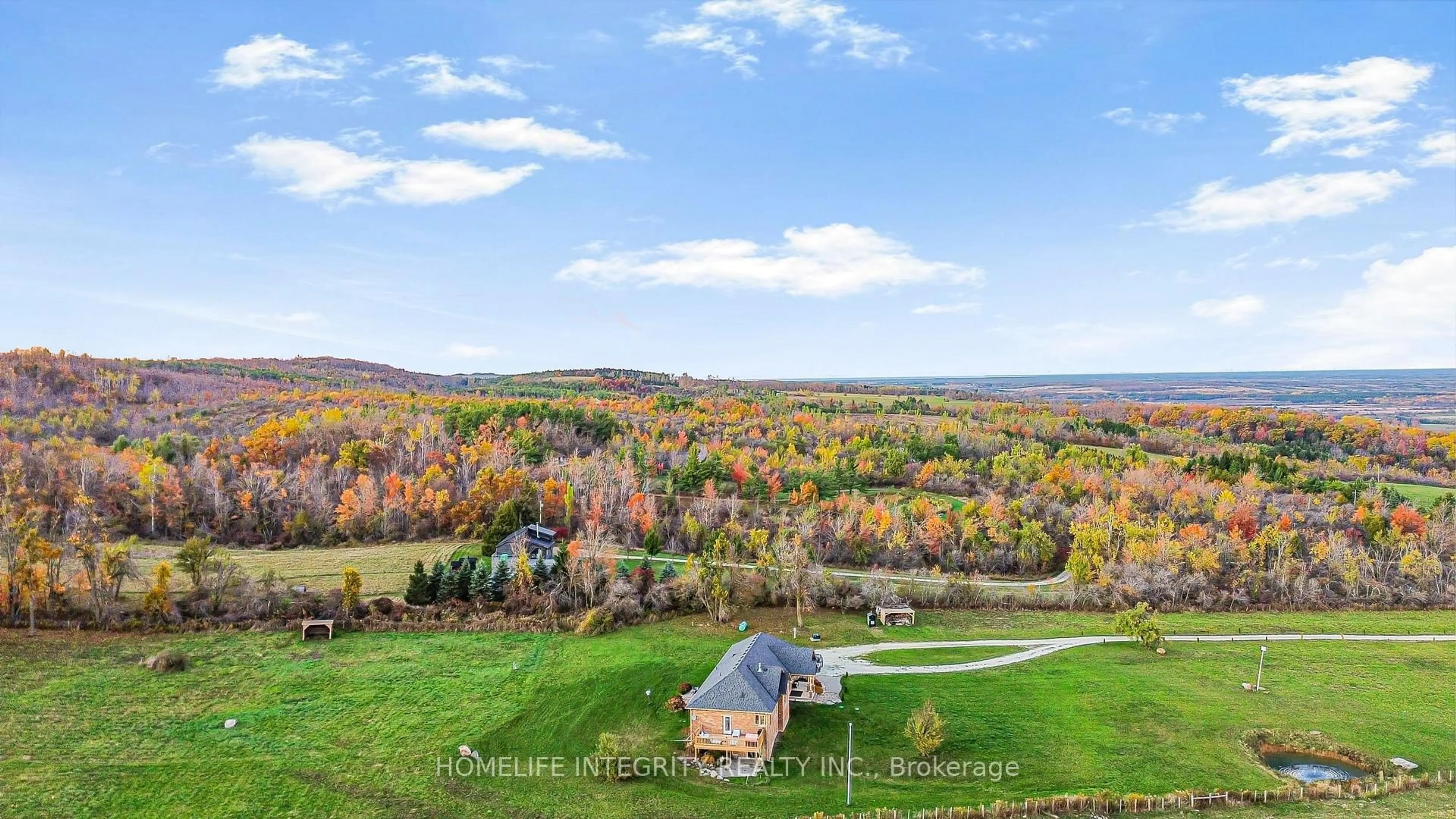 A pic from outside/outdoor area/front of a property/back of a property/a pic from drone, unknown for 838722 4th Line, Mulmur Ontario L9V 0J7