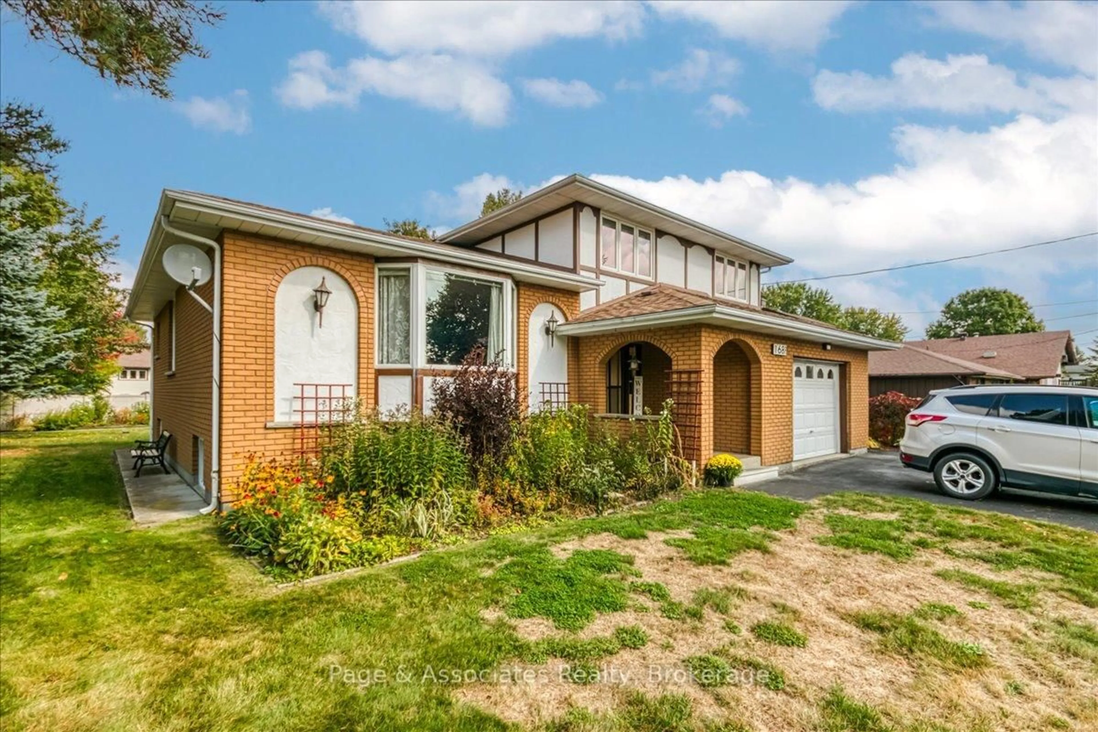 Home with brick exterior material, street for 1688 Richard St, Greater Sudbury Ontario P3N 1H2