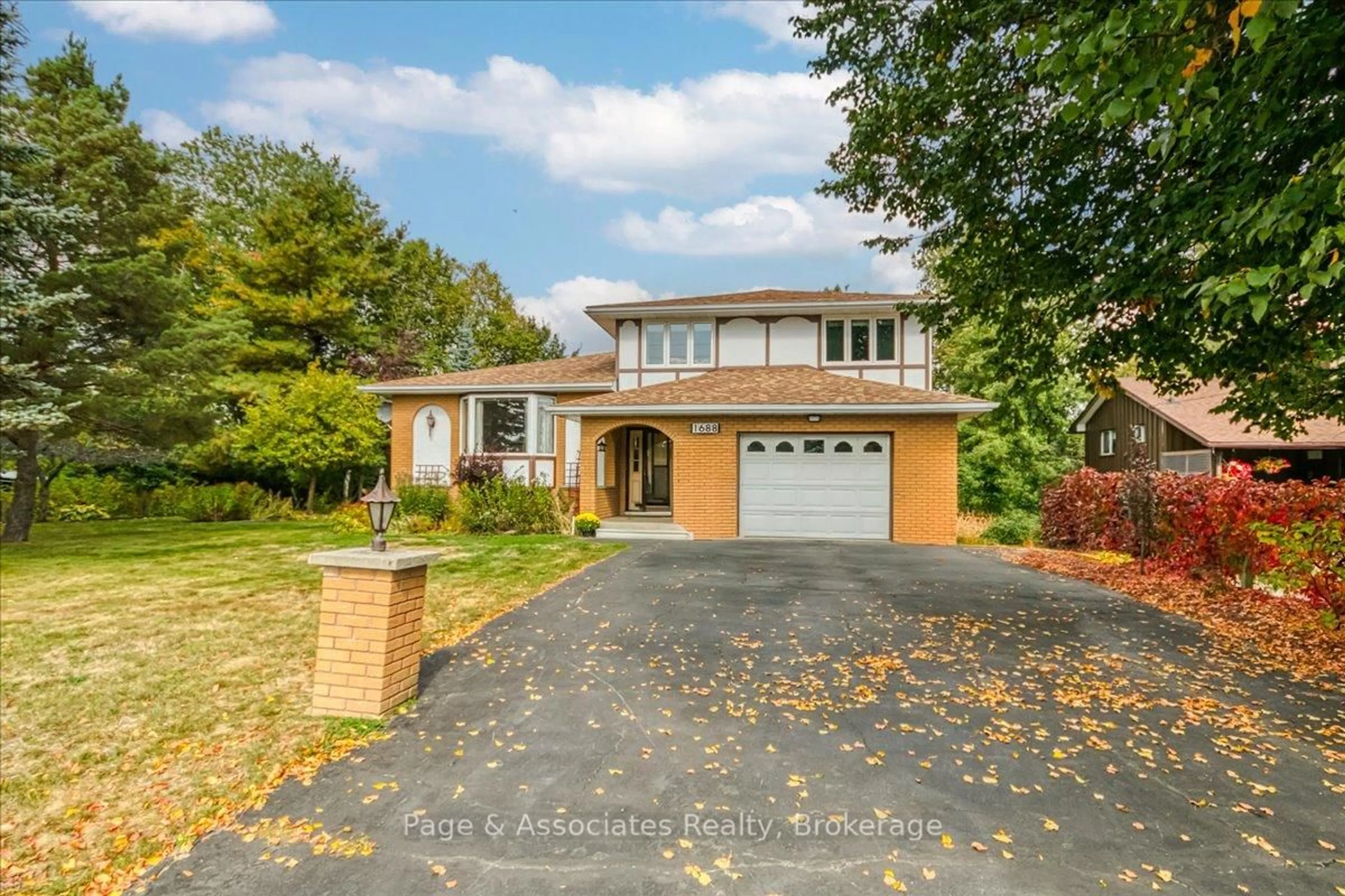 Home with brick exterior material, street for 1688 Richard St, Greater Sudbury Ontario P3N 1H2