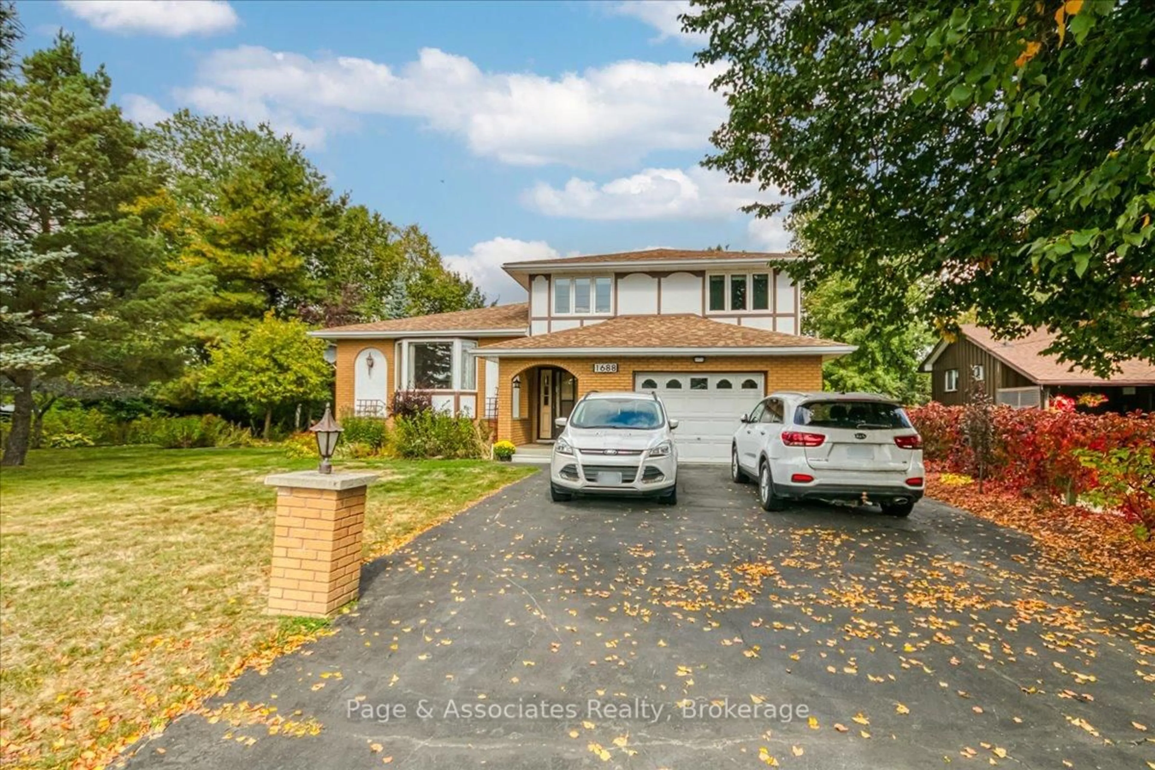 Home with brick exterior material, street for 1688 Richard St, Greater Sudbury Ontario P3N 1H2