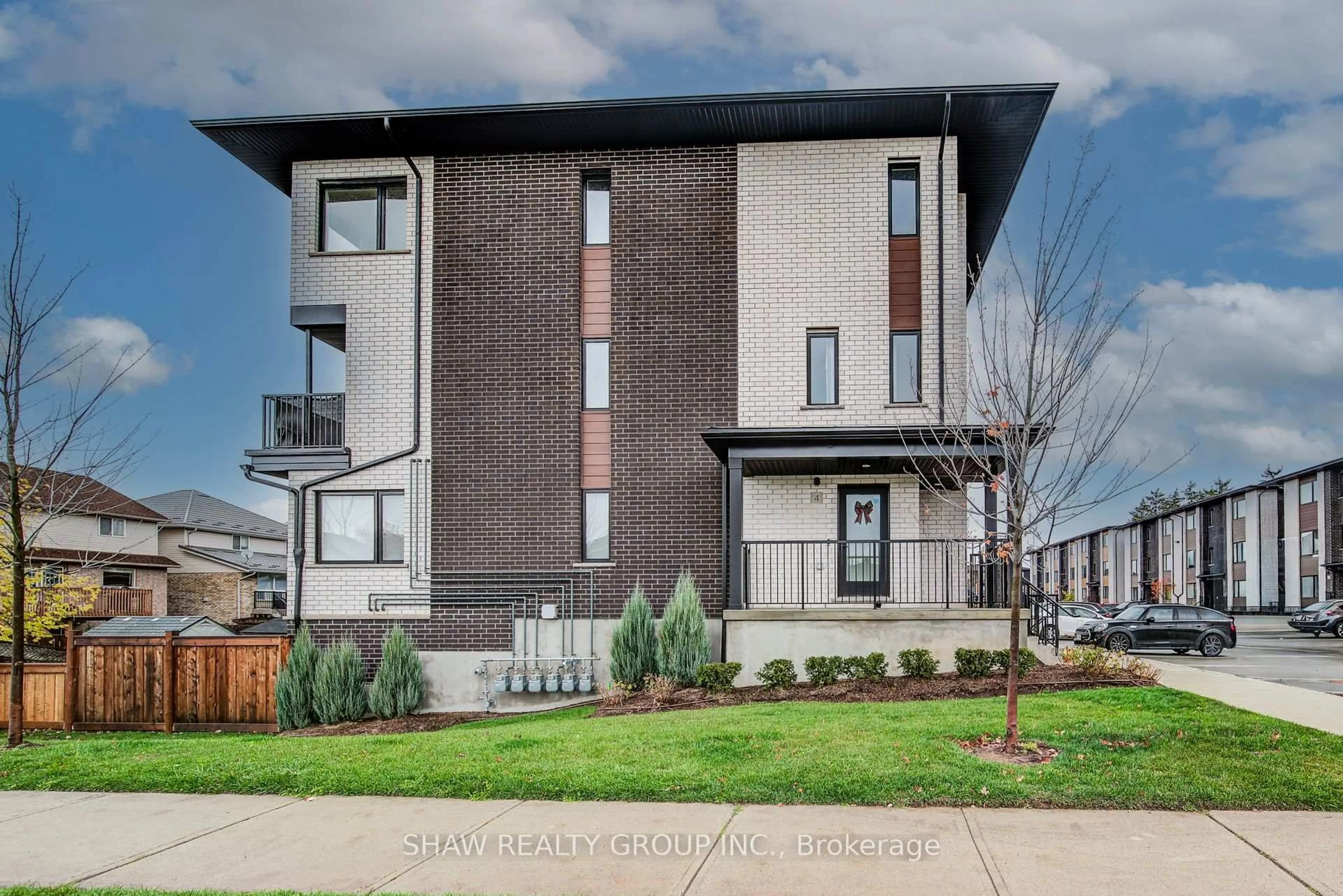 Home with brick exterior material, street for 4 Lily Lane, Guelph Ontario N1L 0R2