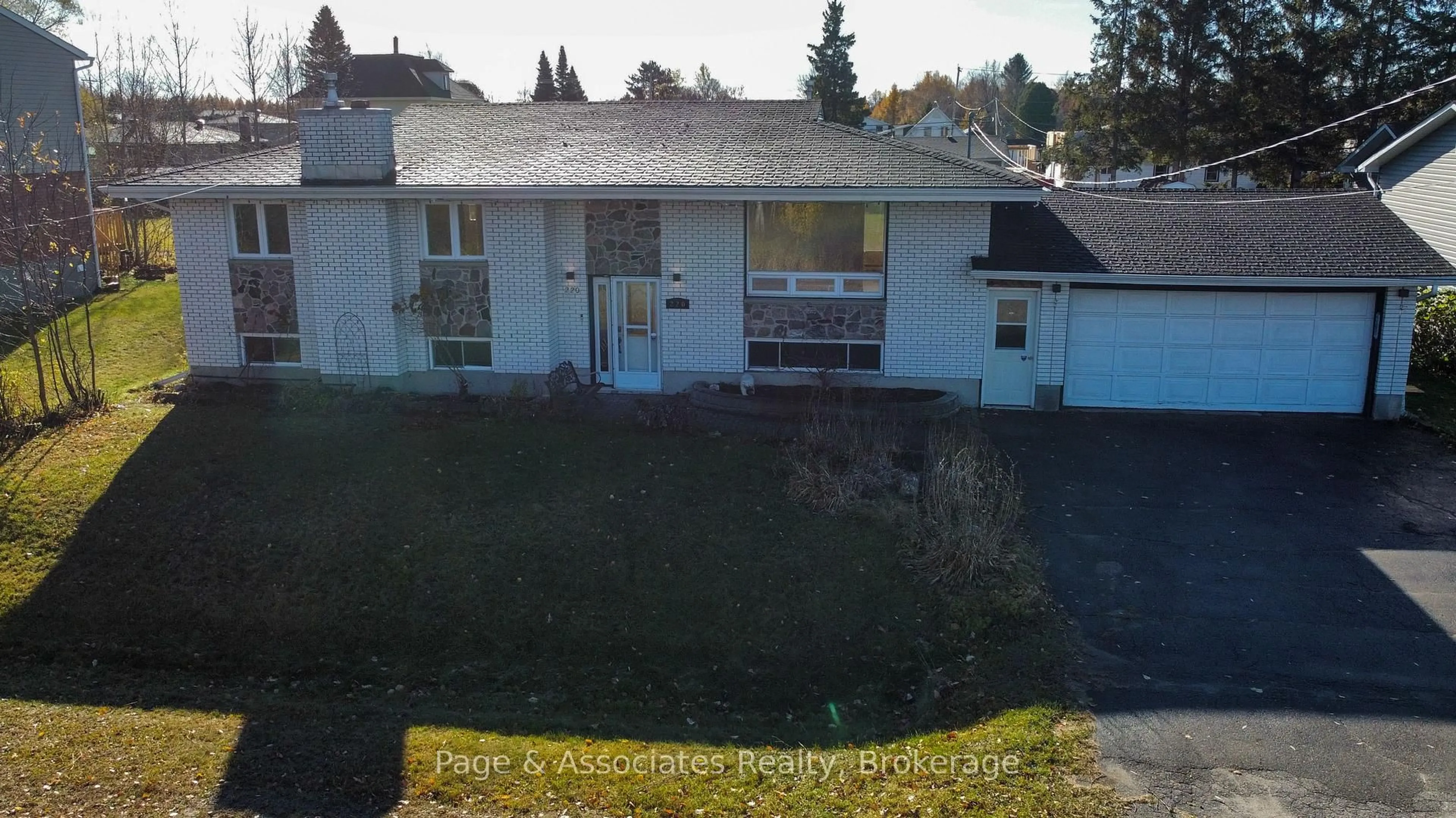 A pic from outside/outdoor area/front of a property/back of a property/a pic from drone, street for 220 Railway St, West Nipissing Ontario P2B 3B2