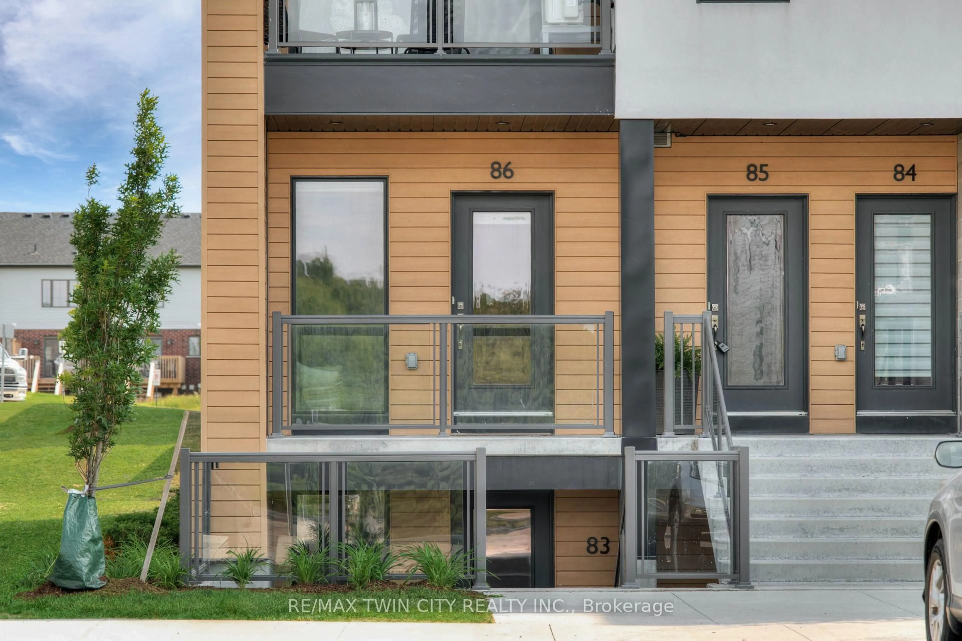Home with brick exterior material, street for 261 Woodbine Ave #86, Kitchener Ontario N2R 0S7