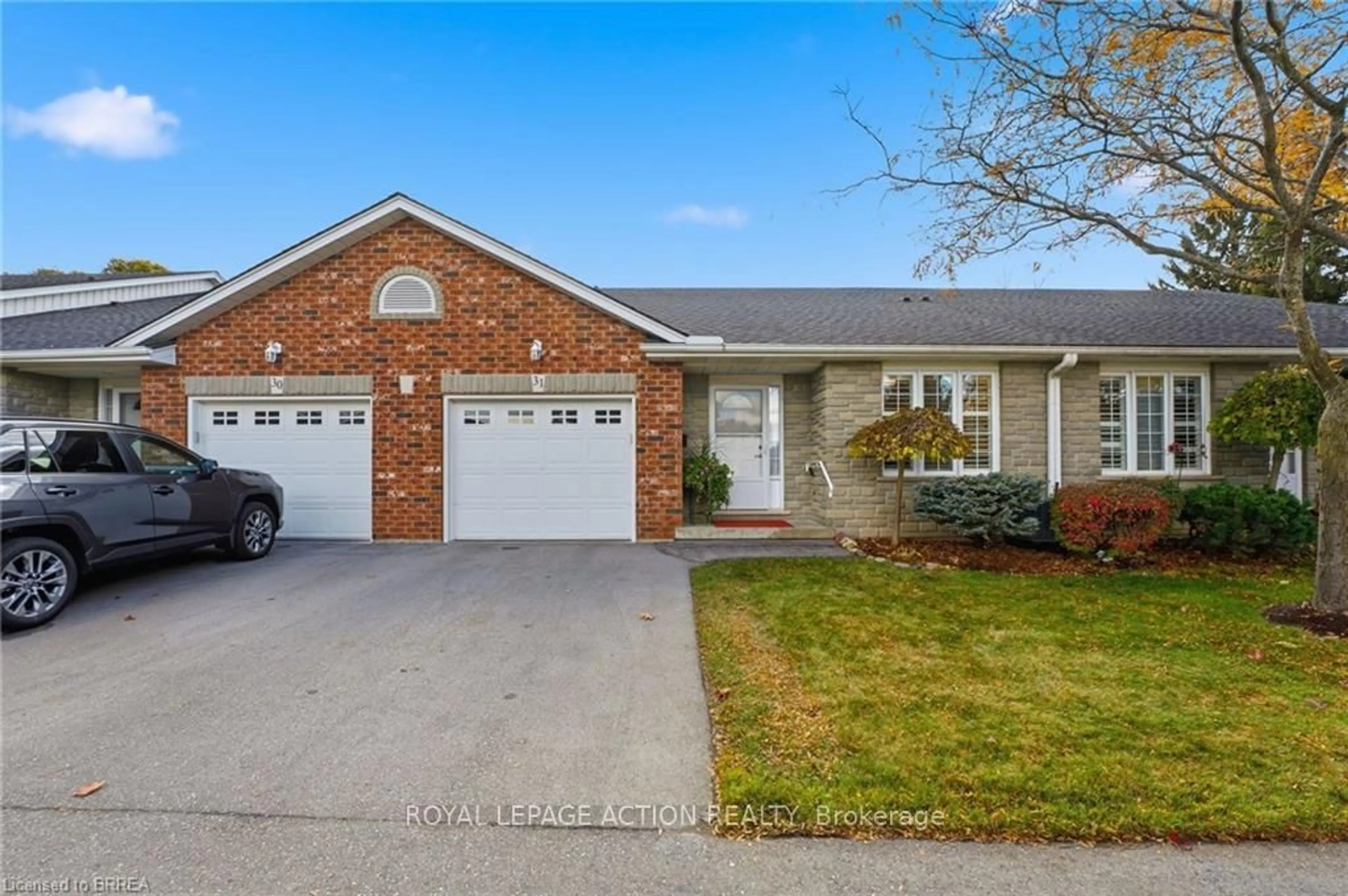 Home with brick exterior material, street for 53 Heron's Landing #31, Woodstock Ontario N4T 1V2