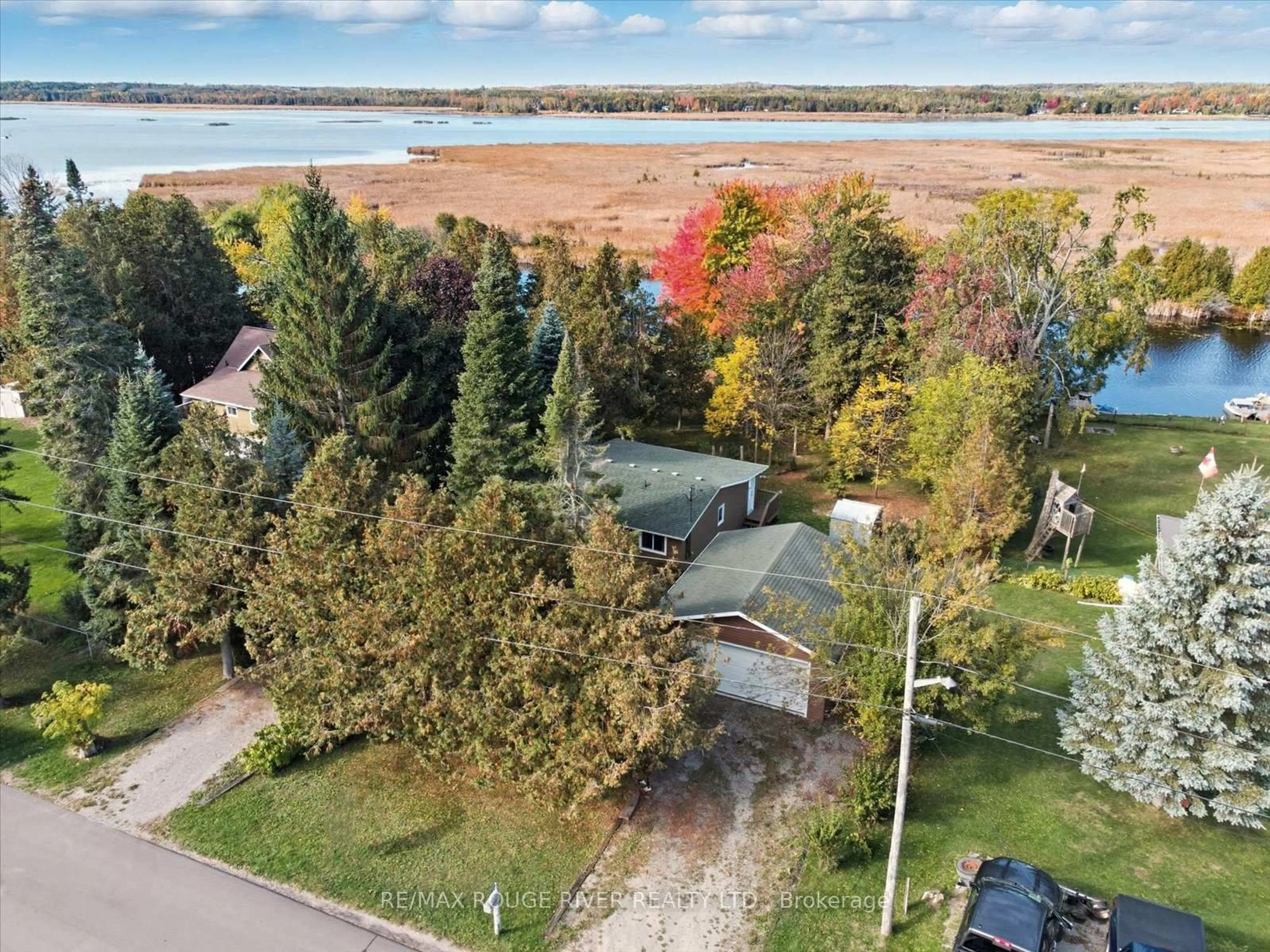A pic from outside/outdoor area/front of a property/back of a property/a pic from drone, water/lake/river/ocean view for 65 Cedarview Dr, Kawartha Lakes Ontario K0L 2W0