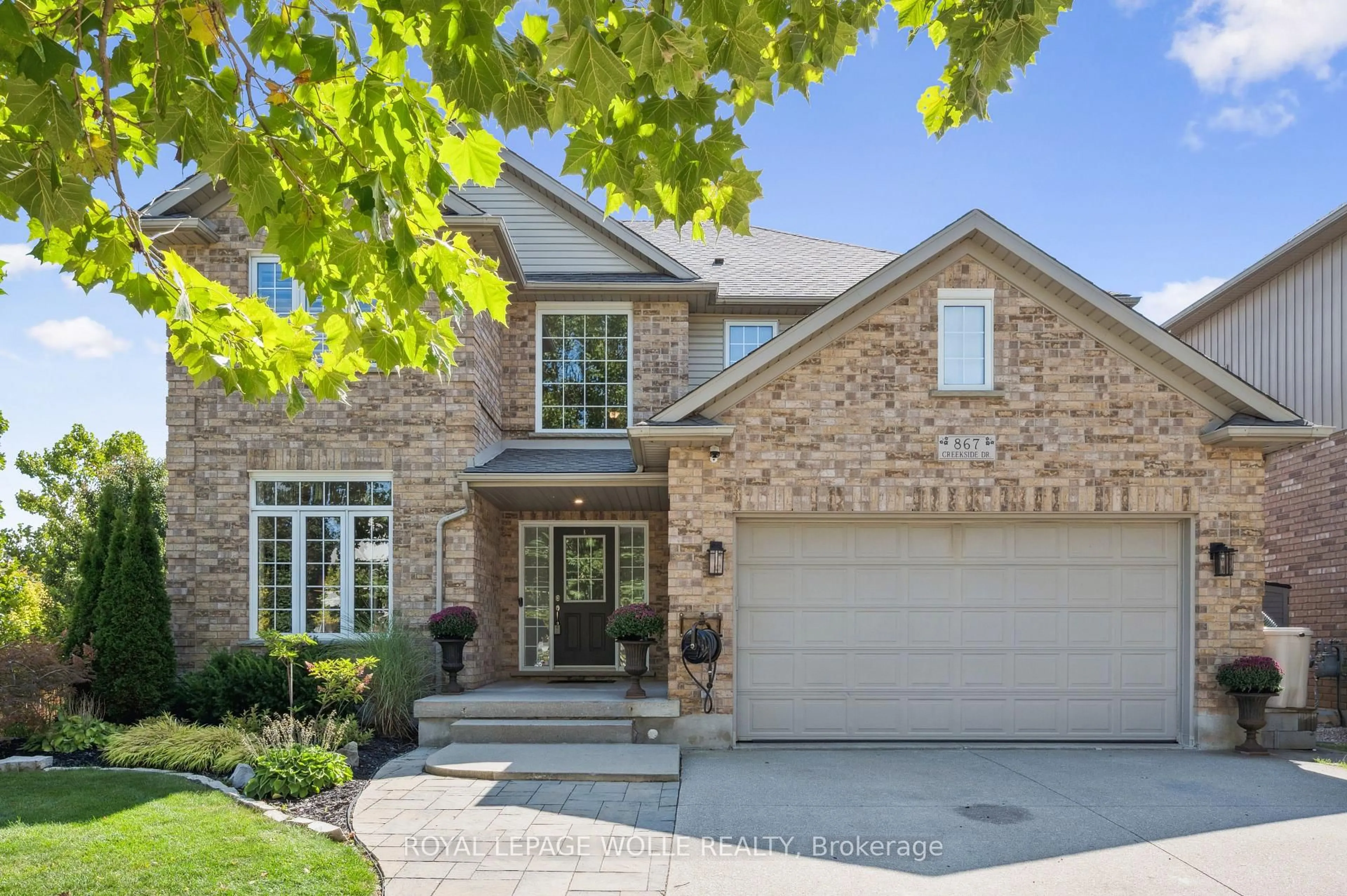 Home with brick exterior material, street for 867 Creekside Dr, Waterloo Ontario N2V 2S7