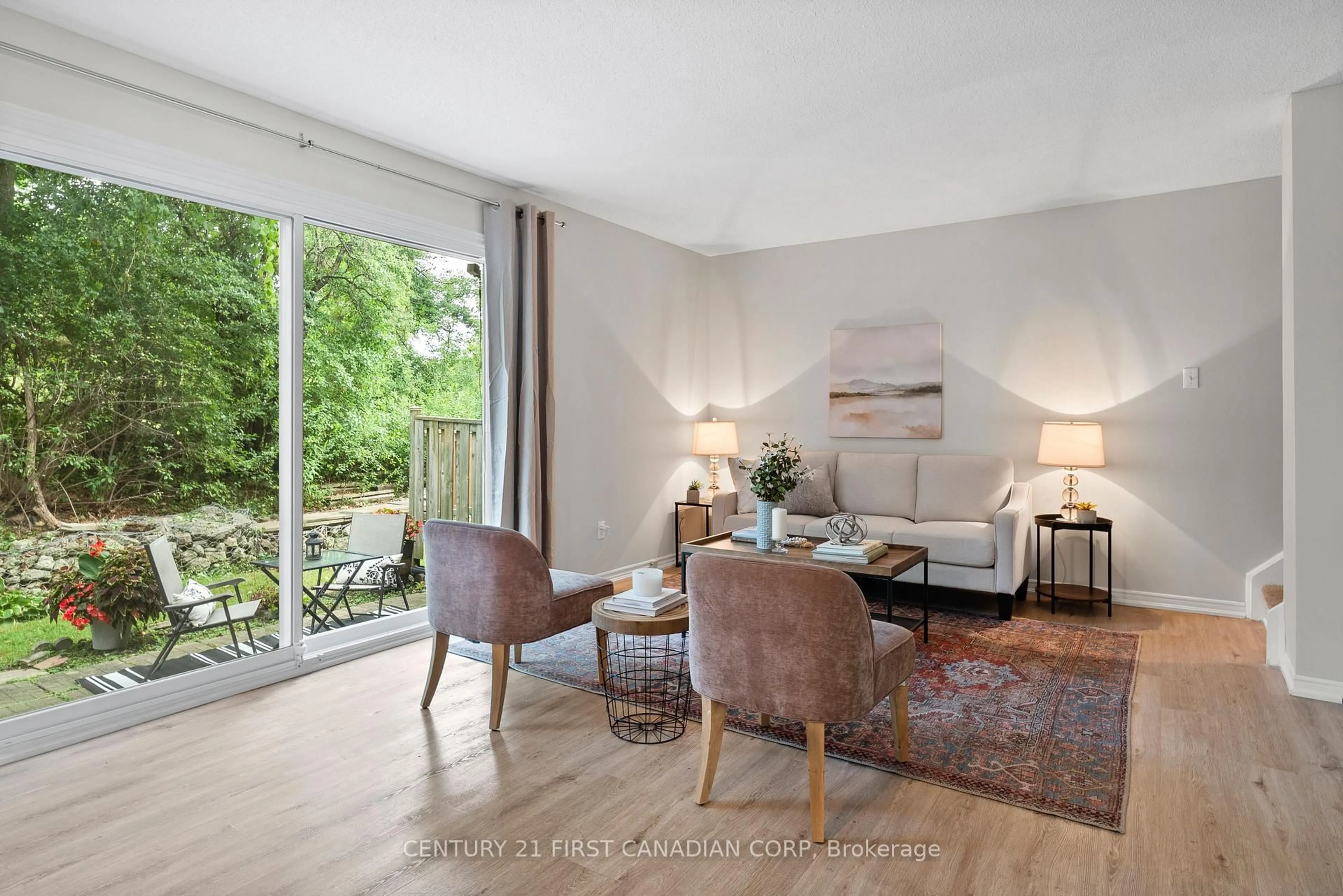 Living room with furniture, wood/laminate floor for 120 Centre St #56, London South Ontario N6J 4X4