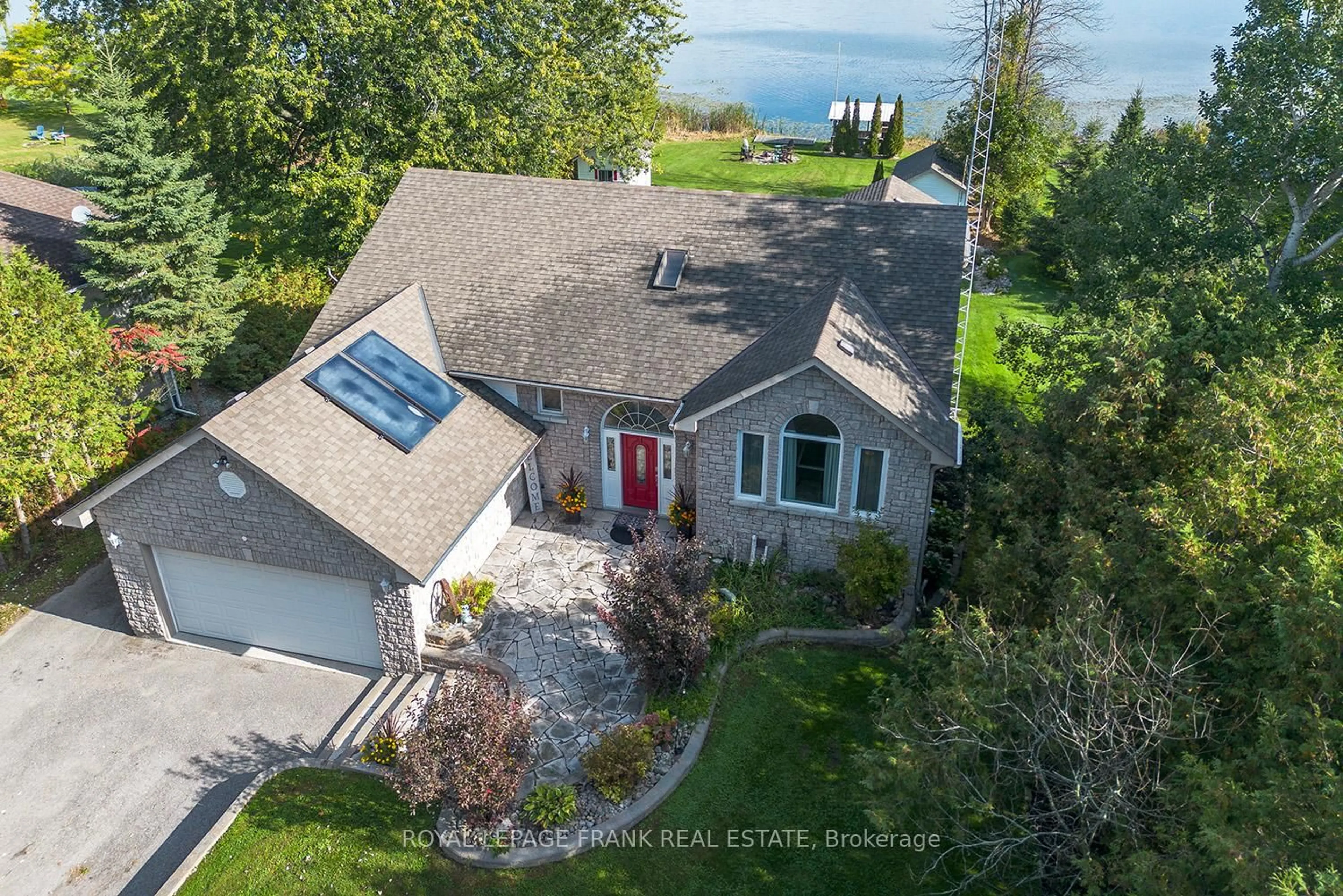 A pic from outside/outdoor area/front of a property/back of a property/a pic from drone, water/lake/river/ocean view for 25 Shelley Dr, Kawartha Lakes Ontario K0M 2C0