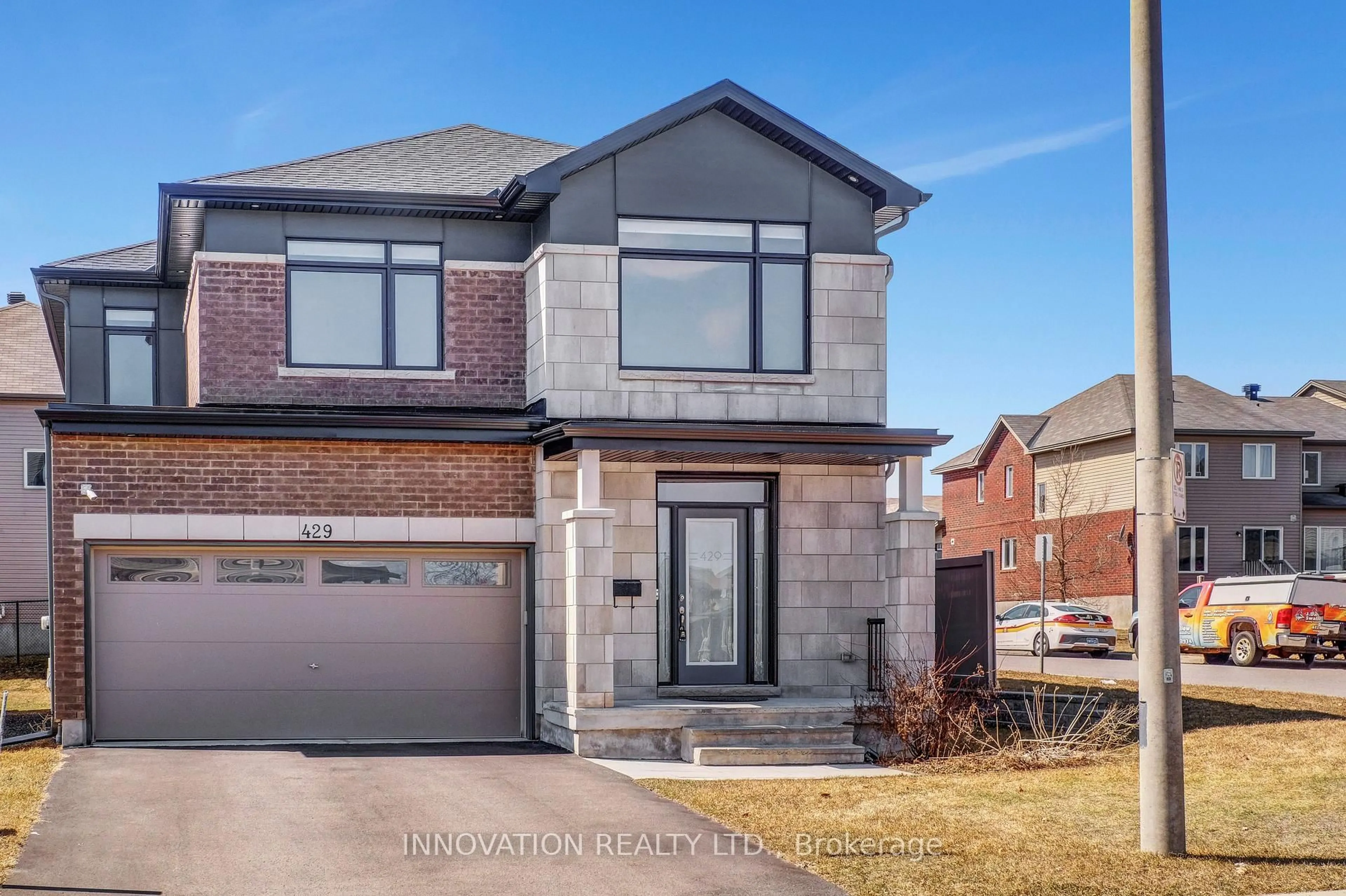 Home with brick exterior material, street for 429 Fernside St, Ottawa Ontario K2T 0L2