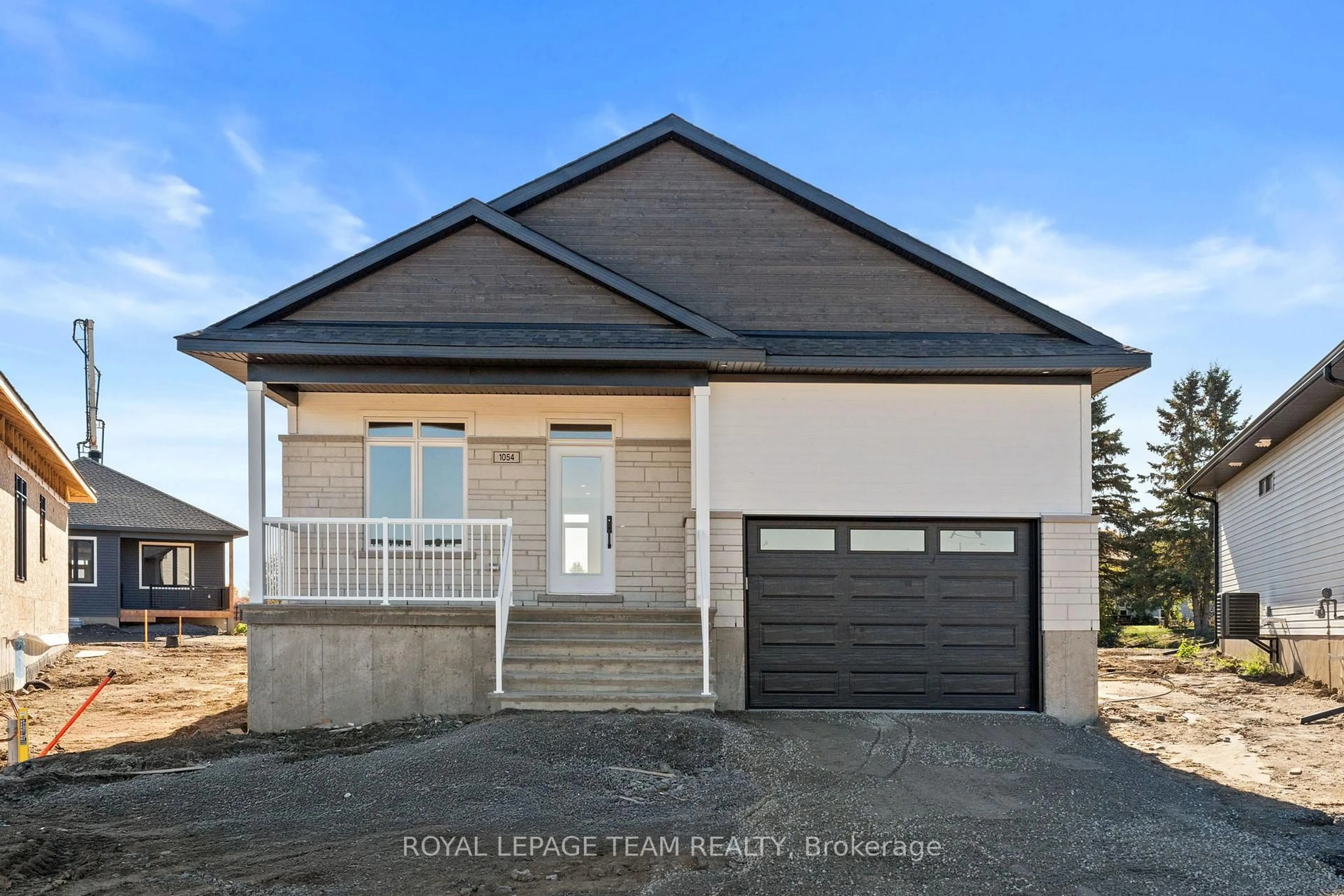 Home with vinyl exterior material, street for 1054 Turner Dr, Brockville Ontario K6V 0G8