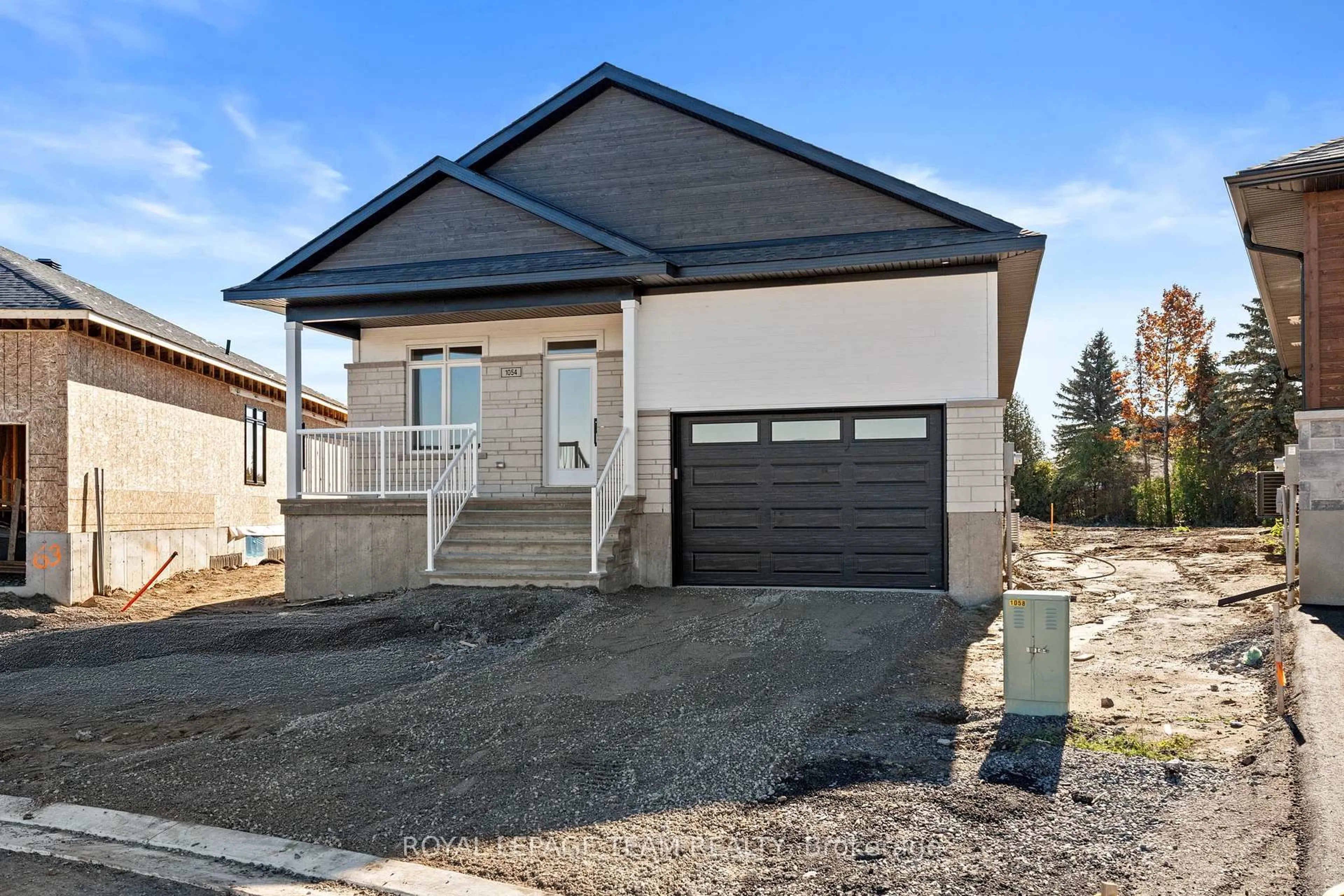 Home with vinyl exterior material, street for 1054 Turner Dr, Brockville Ontario K6V 0G8