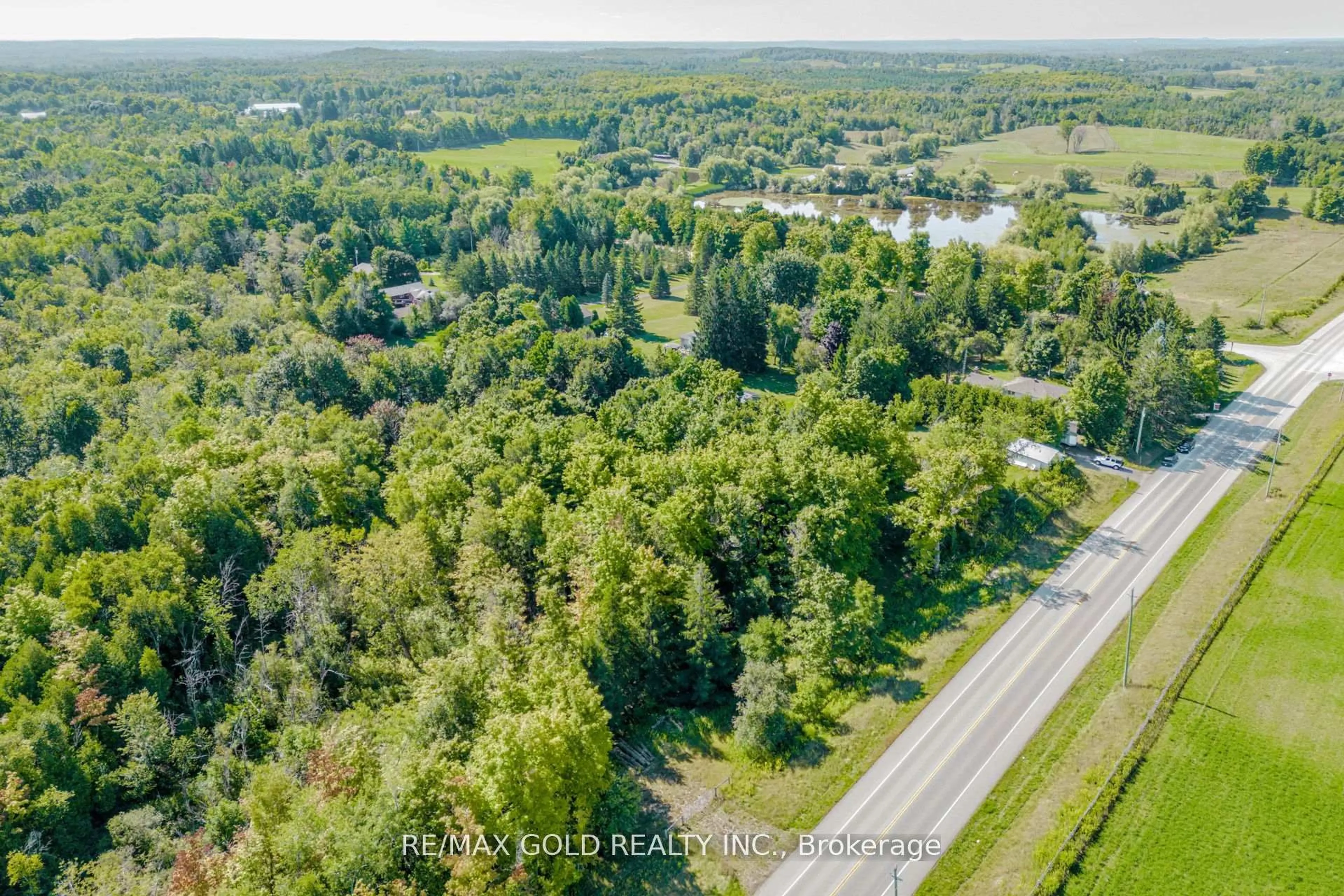 A pic from outside/outdoor area/front of a property/back of a property/a pic from drone, forest/trees view for 9109 Wellington Rd 50, Erin Ontario L7J 2L8