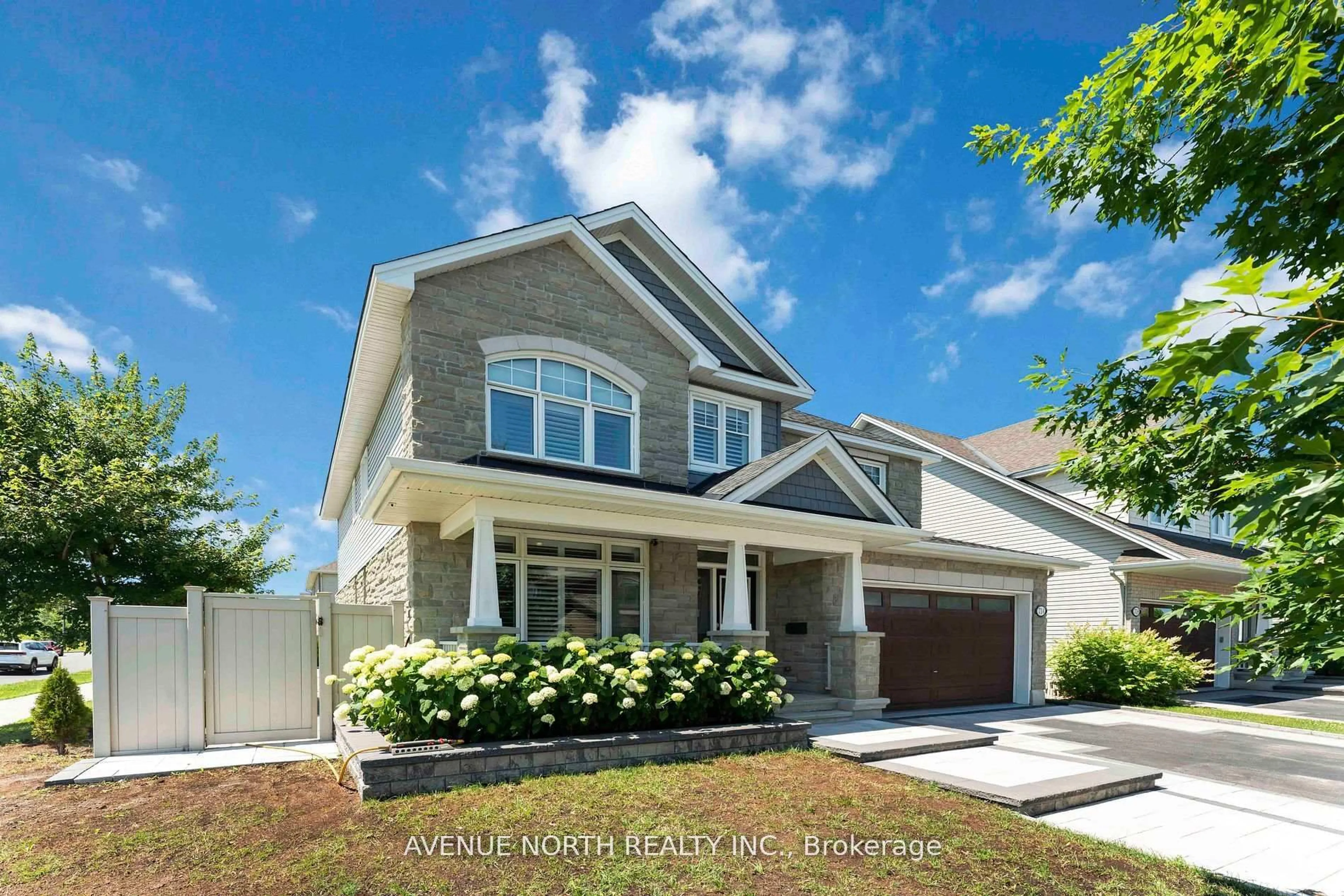 Home with brick exterior material, street for 714 BUNCHBERRY Way, Ottawa Ontario K1T 0J8