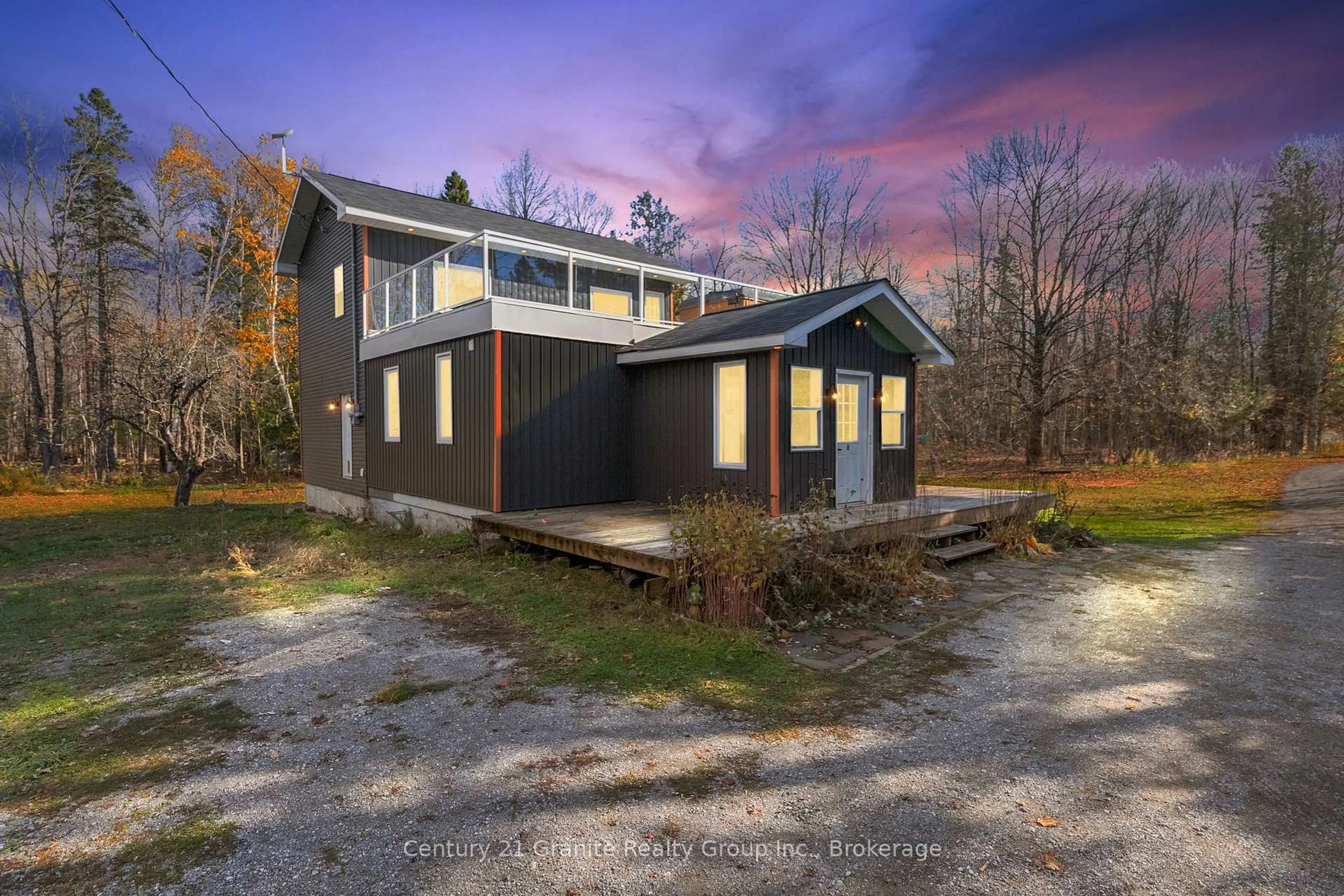 A pic from outside/outdoor area/front of a property/back of a property/a pic from drone, building for 1126 Rice Rd, Minden Hills Ontario K0M 2K0