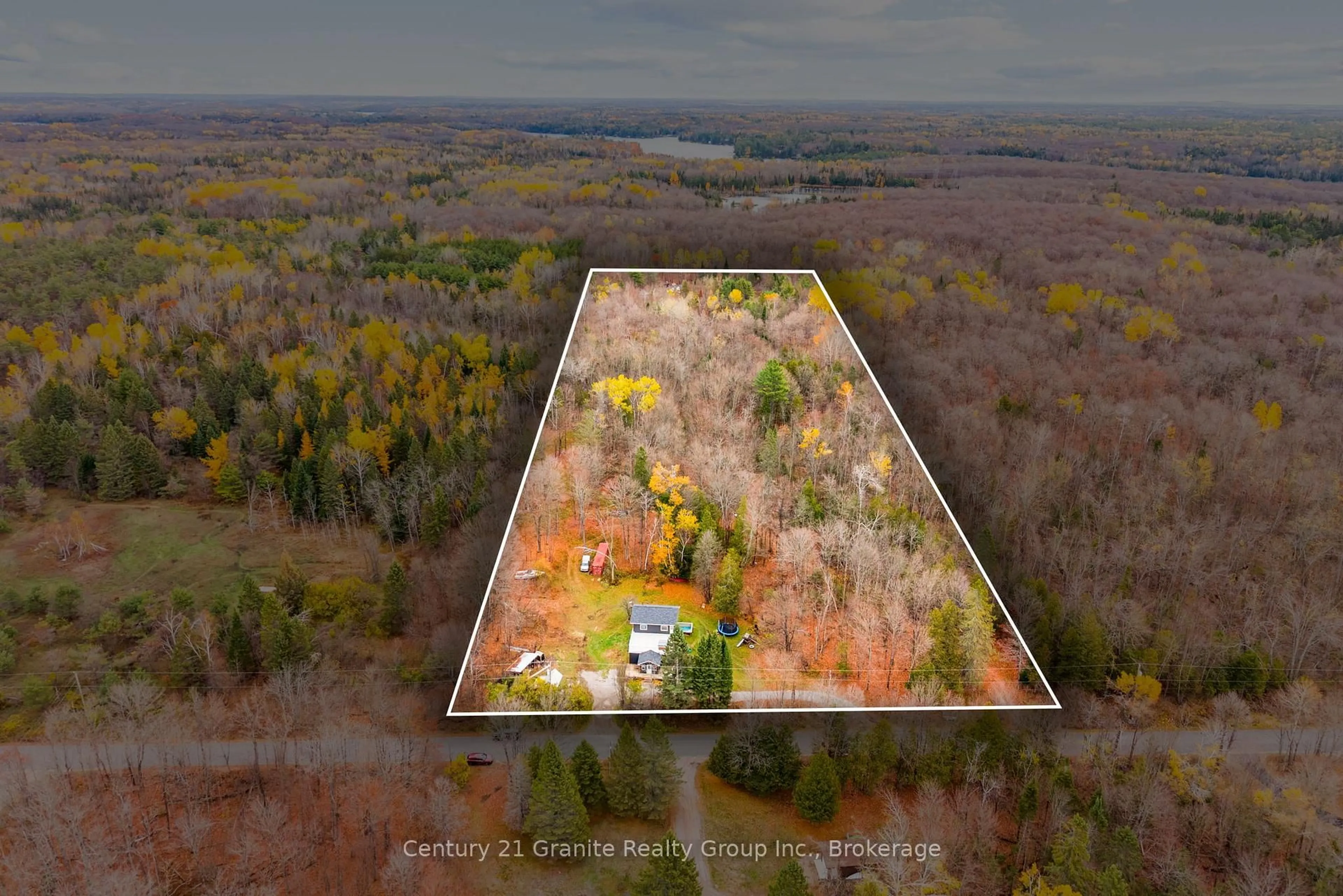 A pic from outside/outdoor area/front of a property/back of a property/a pic from drone, forest/trees view for 1126 Rice Rd, Minden Hills Ontario K0M 2K0