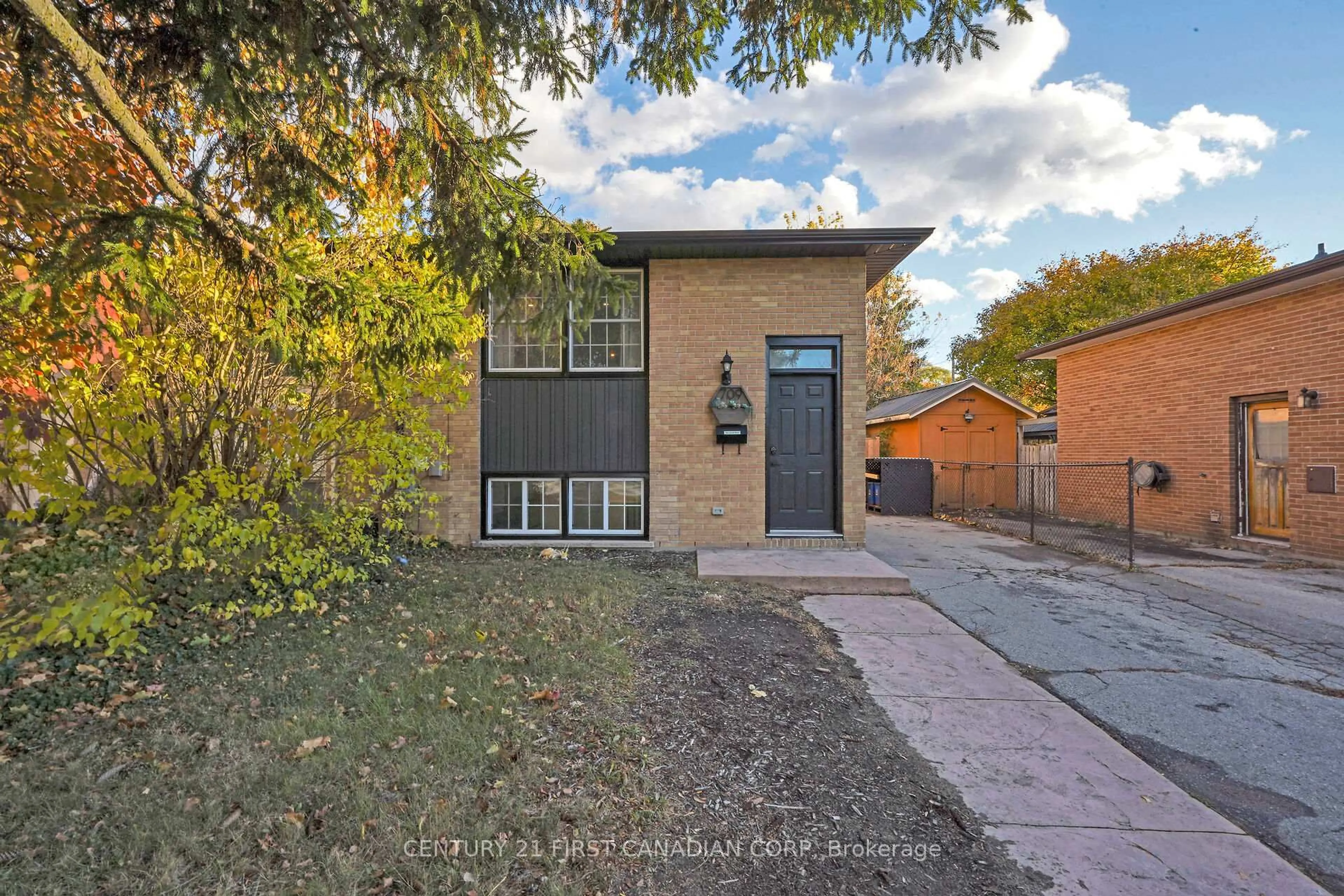 Home with brick exterior material, street for 709 Sevilla Park Pl, London East Ontario N5Y 4H9