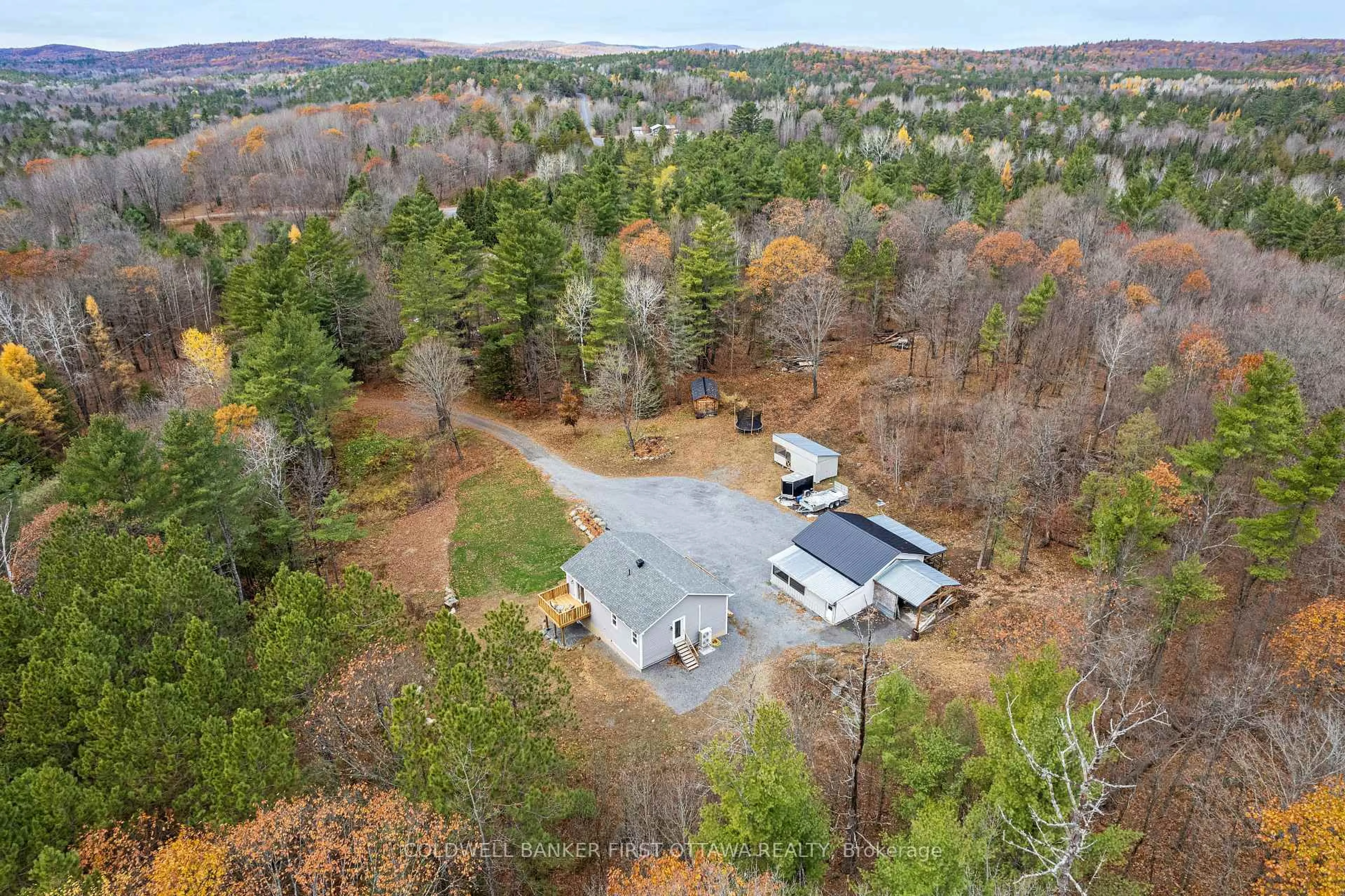 A pic from outside/outdoor area/front of a property/back of a property/a pic from drone, forest/trees view for 946 French Line Rd, Lanark Ontario K0G 1K0