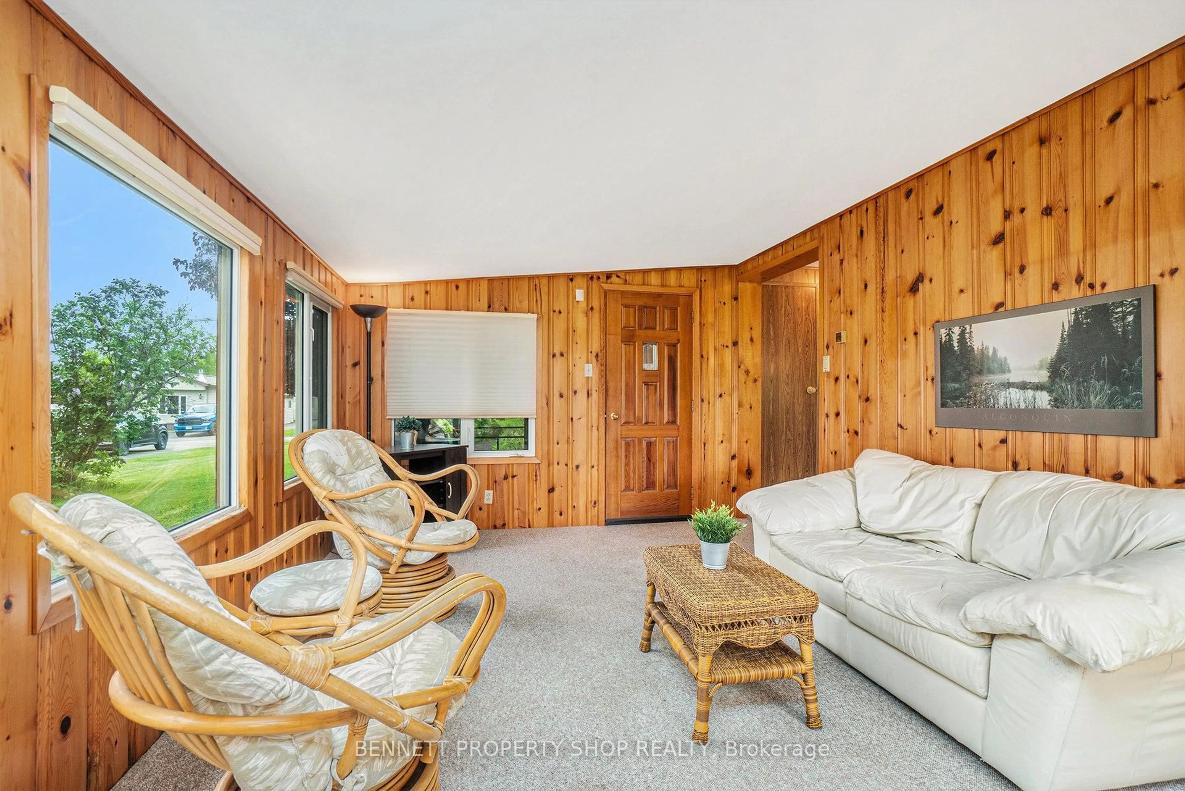 Living room with furniture, wood/laminate floor for 36 Woodside Lane, White Lake Ontario K0A 3L0