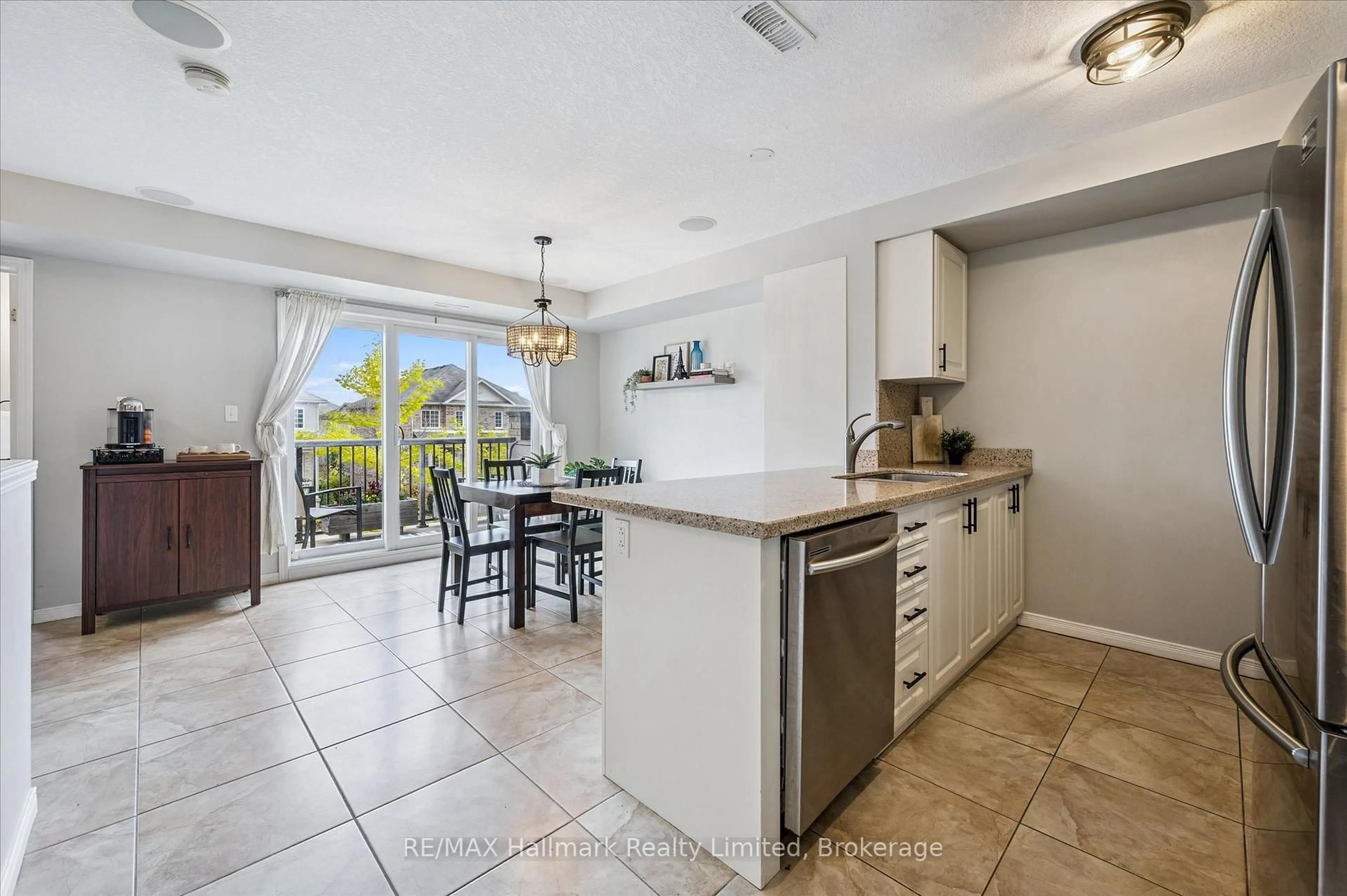 Open concept kitchen, ceramic/tile floor for 35 Mountford Dr #27, Guelph Ontario N1E 0G6