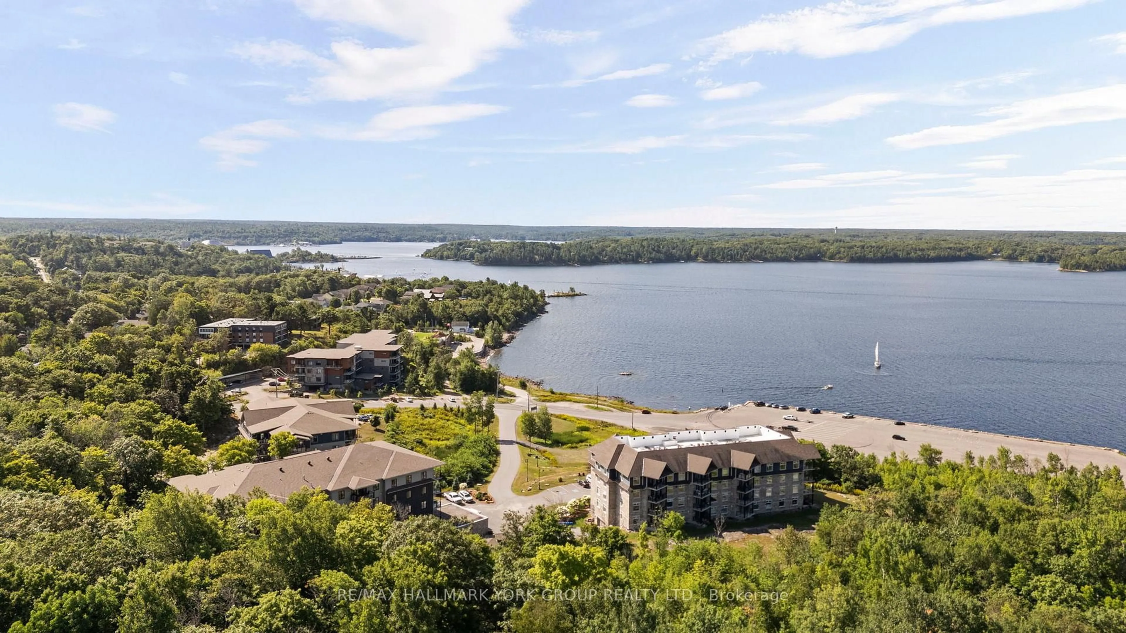 A pic from outside/outdoor area/front of a property/back of a property/a pic from drone, water/lake/river/ocean view for 11A Salt Dock Rd #202, Parry Sound Ontario P2A 3B6
