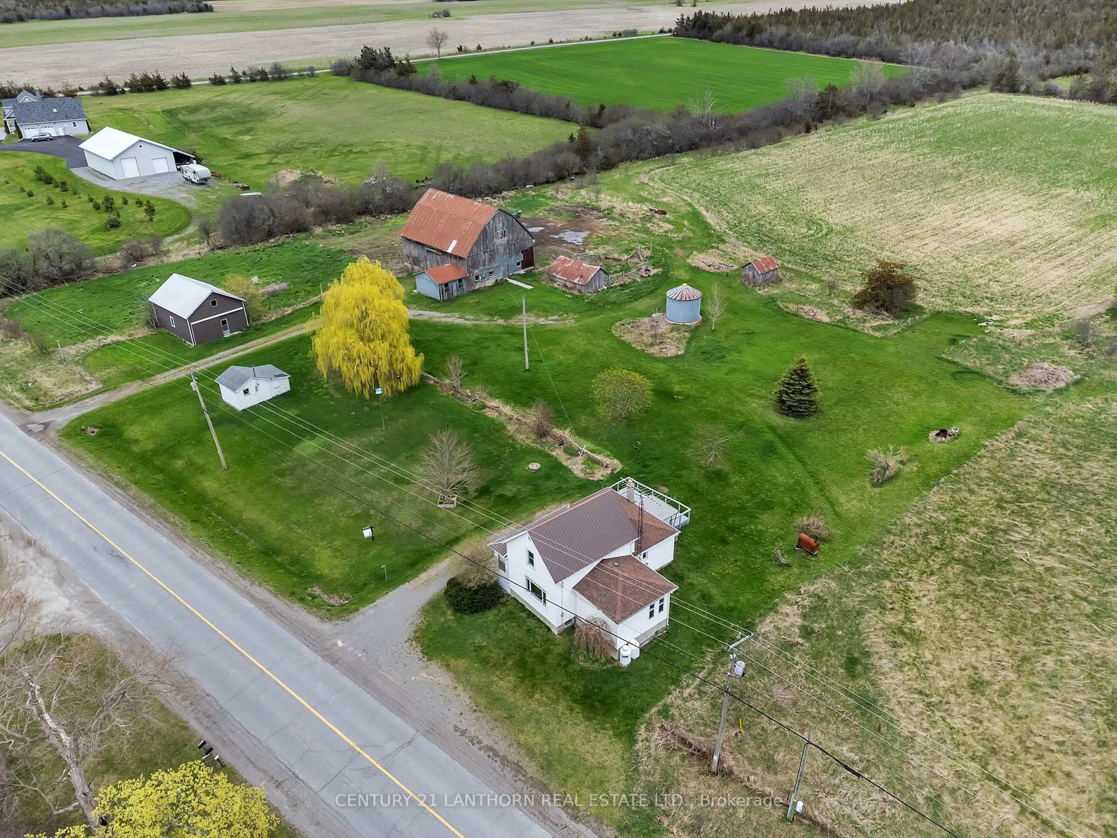 A pic from outside/outdoor area/front of a property/back of a property/a pic from drone, street for 1205 County Road 18 Rd, Prince Edward County Ontario K0K 1P0