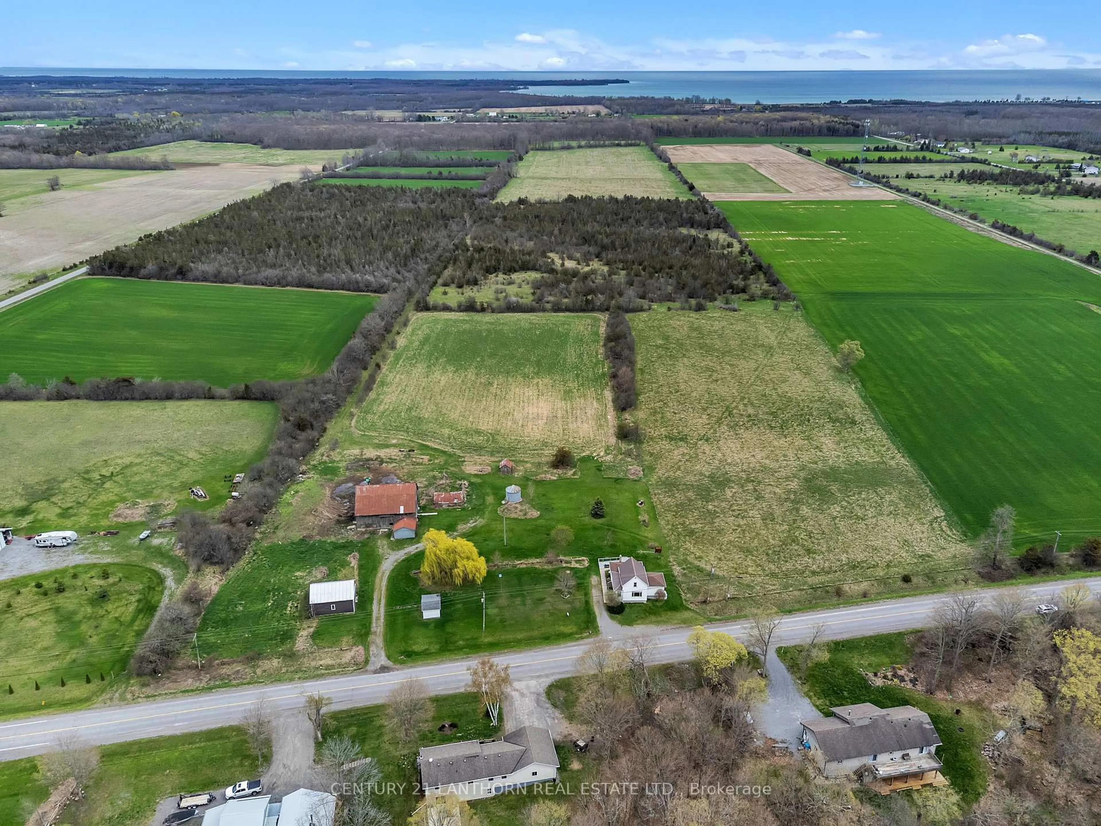 A pic from outside/outdoor area/front of a property/back of a property/a pic from drone, unknown for 1205 County Road 18 Rd, Prince Edward County Ontario K0K 1P0