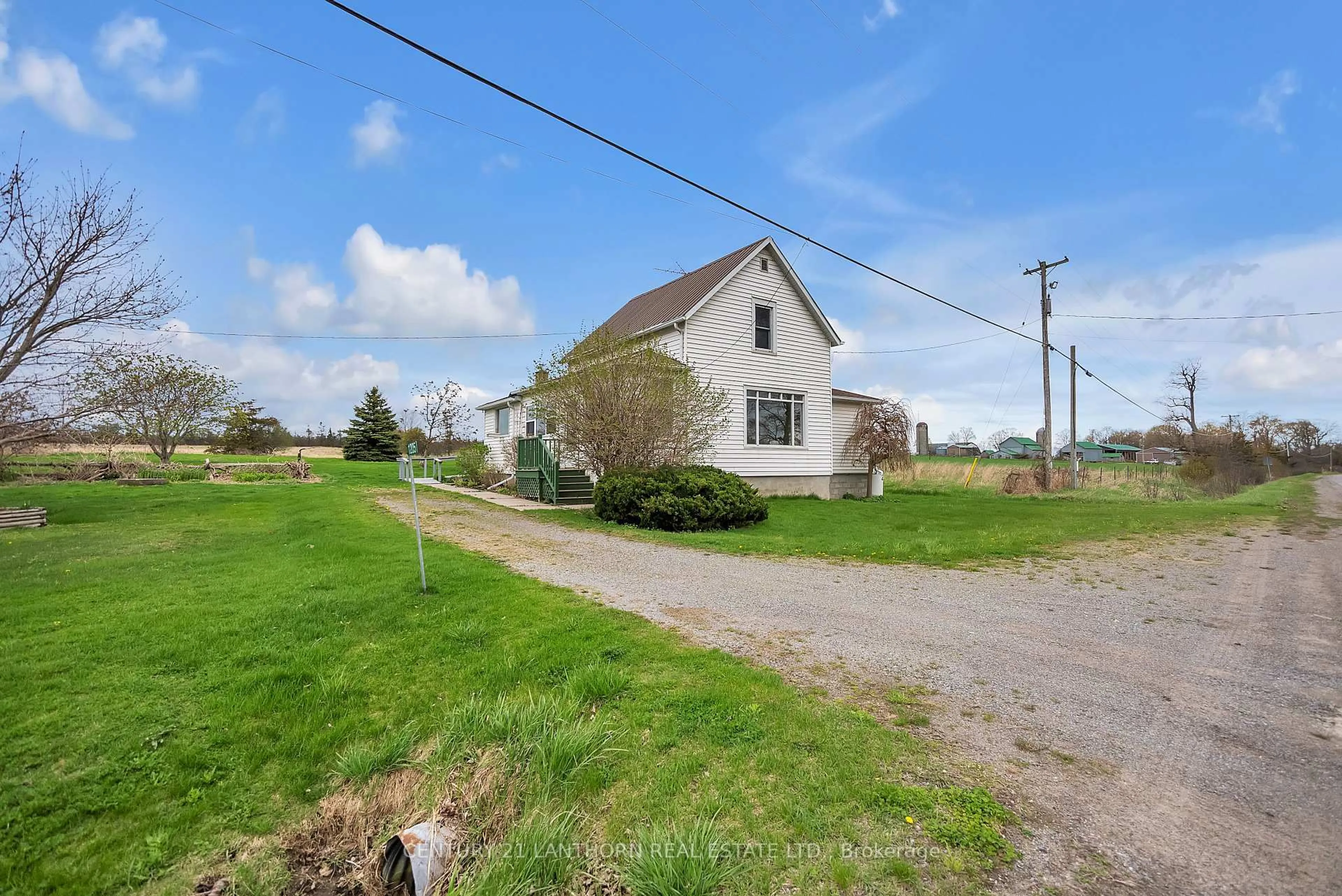 A pic from outside/outdoor area/front of a property/back of a property/a pic from drone, street for 1205 County Road 18 Rd, Prince Edward County Ontario K0K 1P0