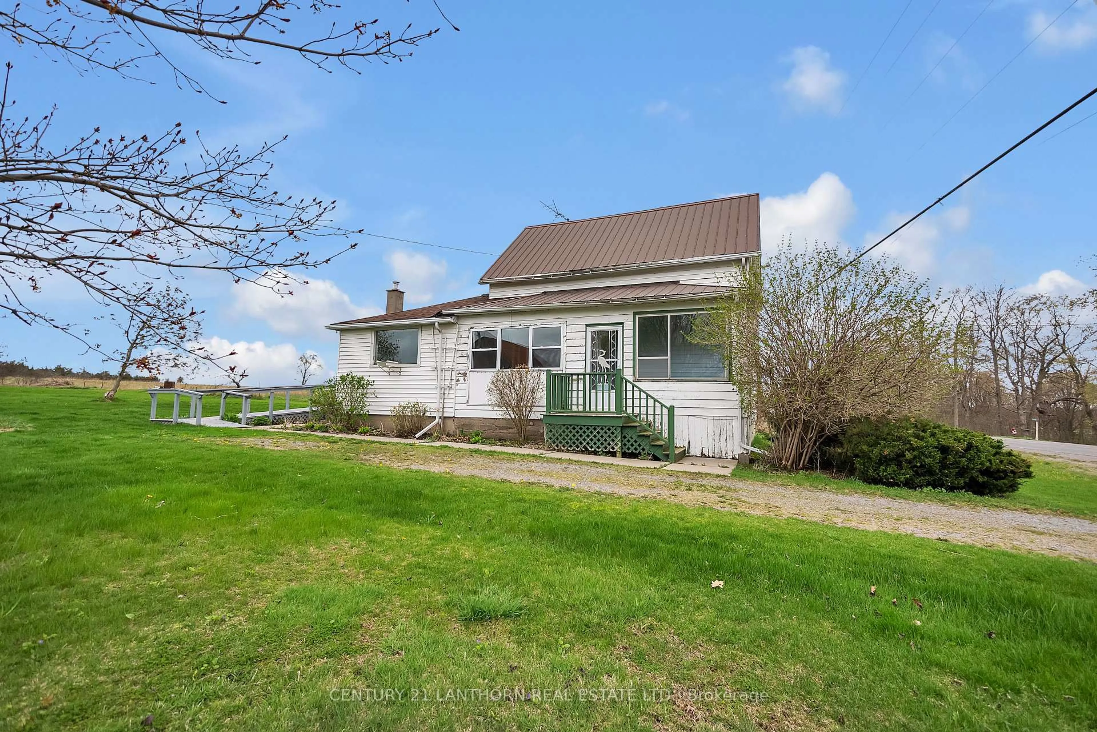 A pic from outside/outdoor area/front of a property/back of a property/a pic from drone, water/lake/river/ocean view for 1205 County Road 18 Rd, Prince Edward County Ontario K0K 1P0