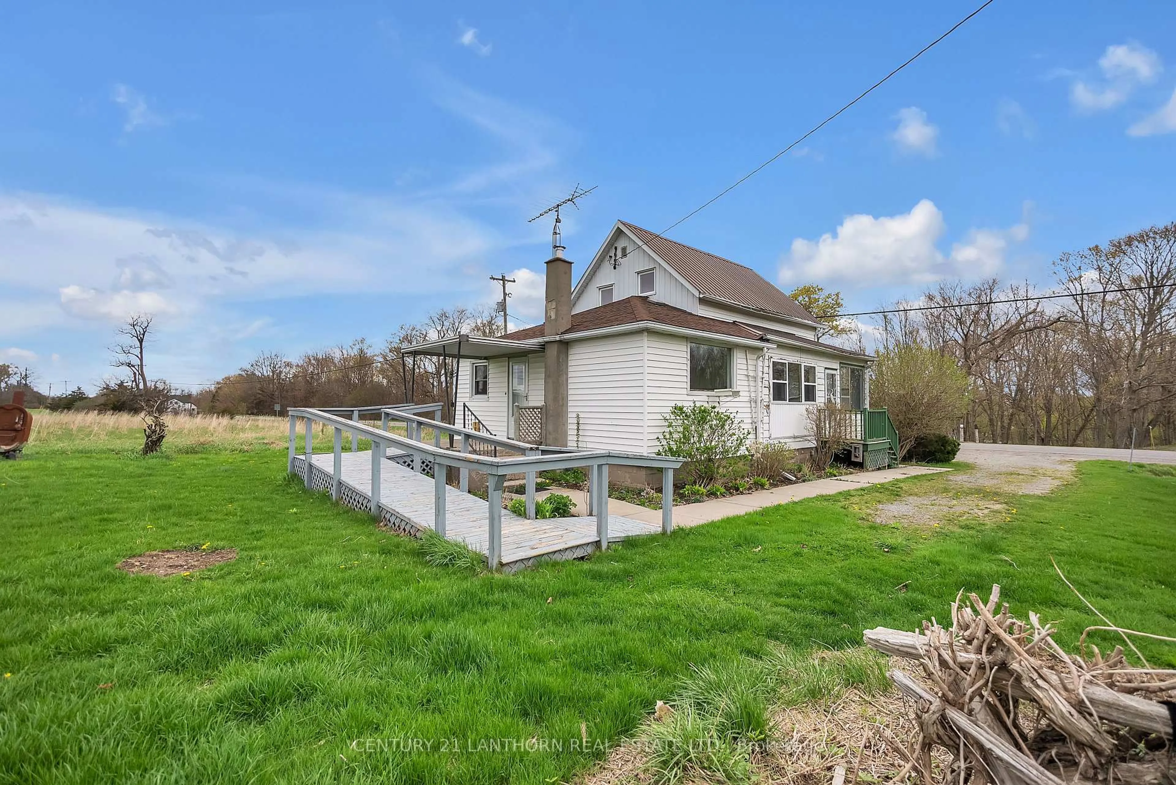 A pic from outside/outdoor area/front of a property/back of a property/a pic from drone, street for 1205 County Road 18 Rd, Prince Edward County Ontario K0K 1P0