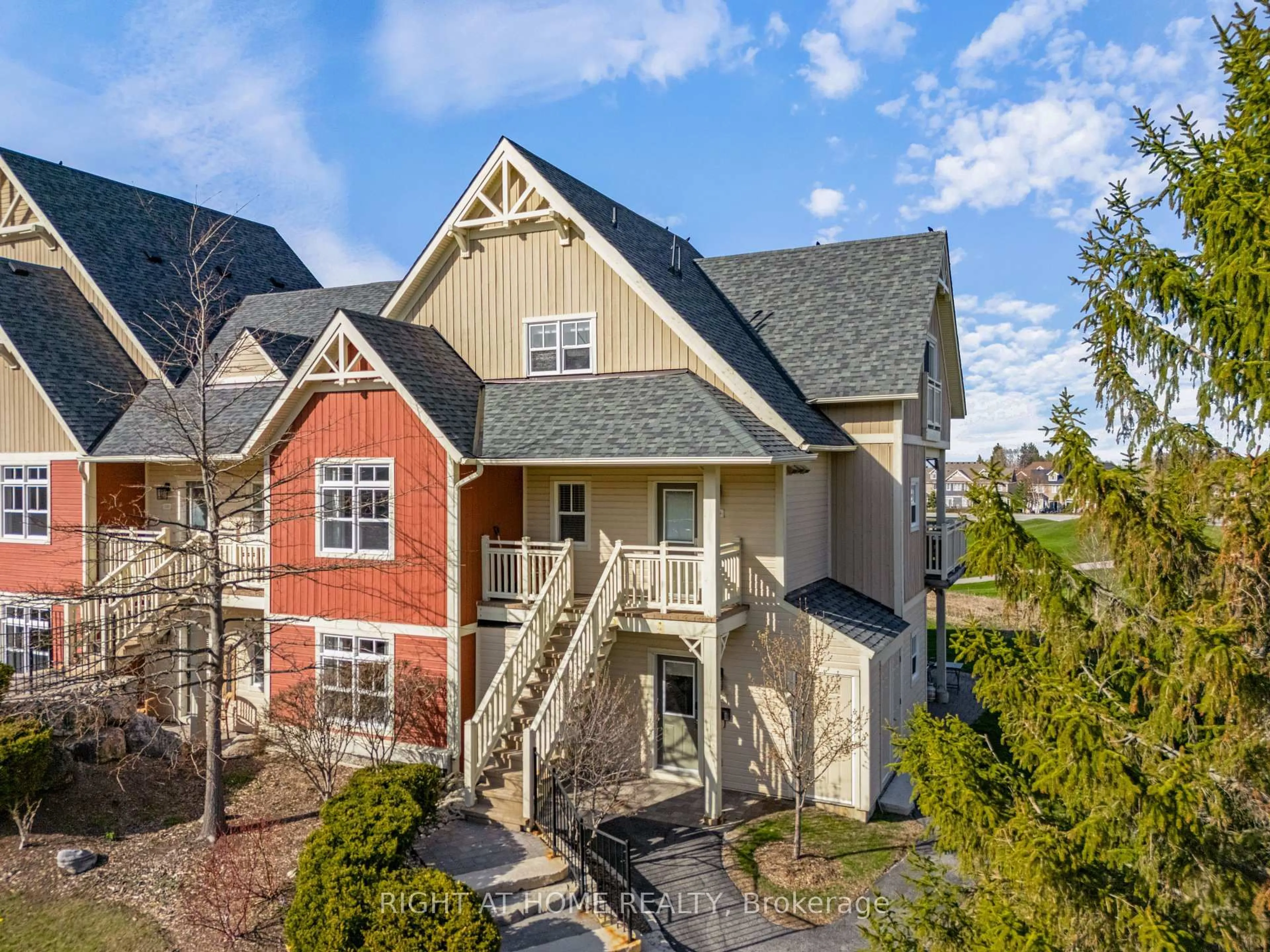 A pic from outside/outdoor area/front of a property/back of a property/a pic from drone, mountain view for 130 Fairway Crt #229, Blue Mountains Ontario N3W 1Y1