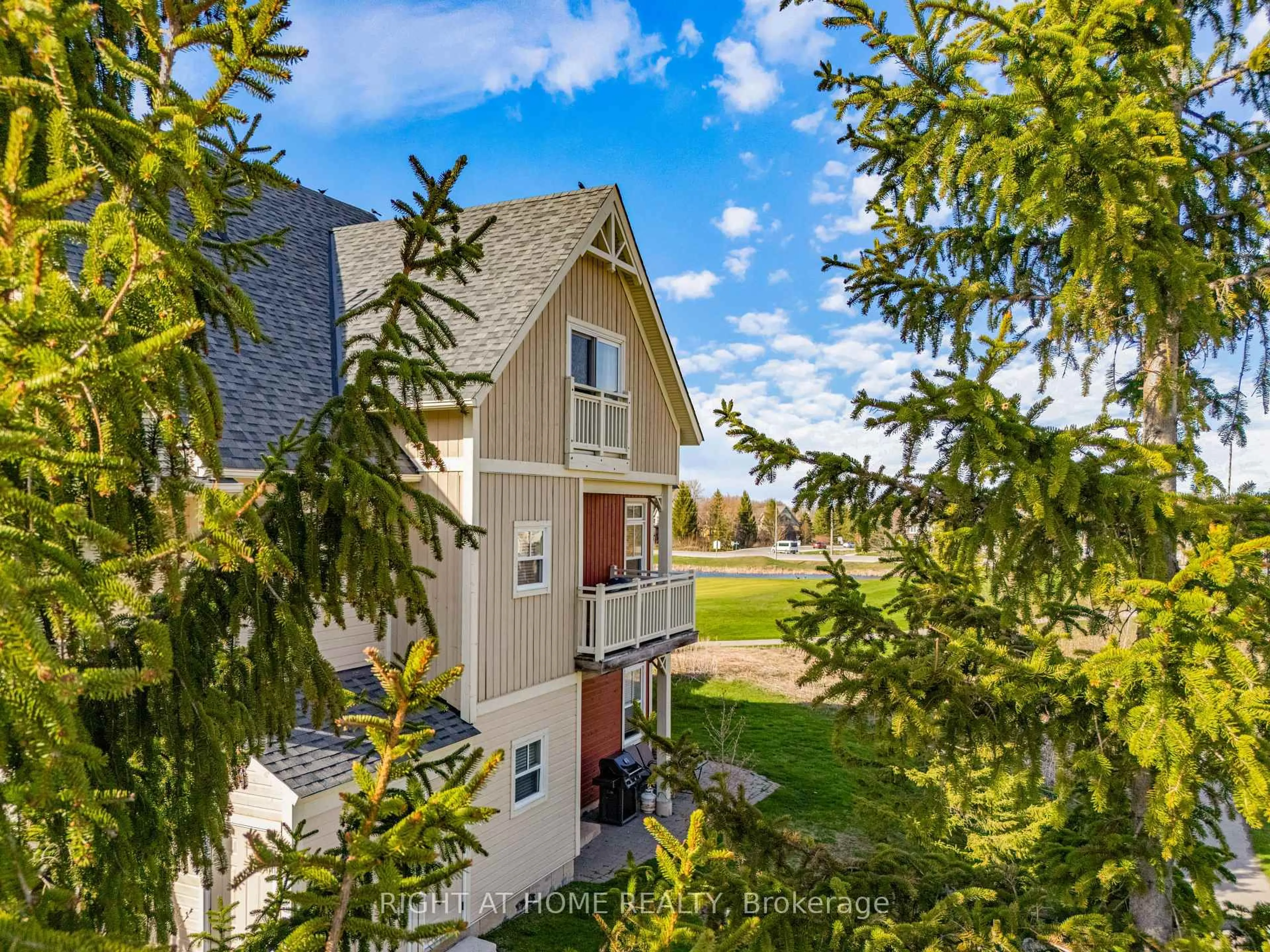 A pic from outside/outdoor area/front of a property/back of a property/a pic from drone, unknown for 130 Fairway Crt #229, Blue Mountains Ontario N3W 1Y1