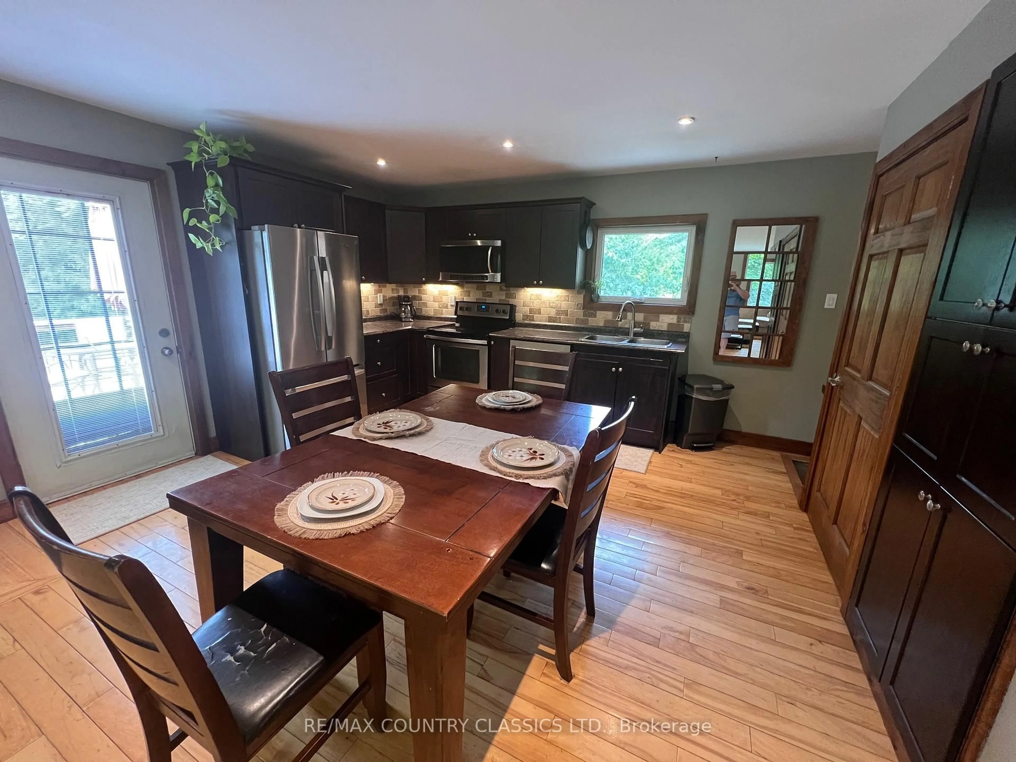Open concept kitchen, wood/laminate floor for 86 Scriven Rd, Otonabee-South Monaghan Ontario K0L 1B0