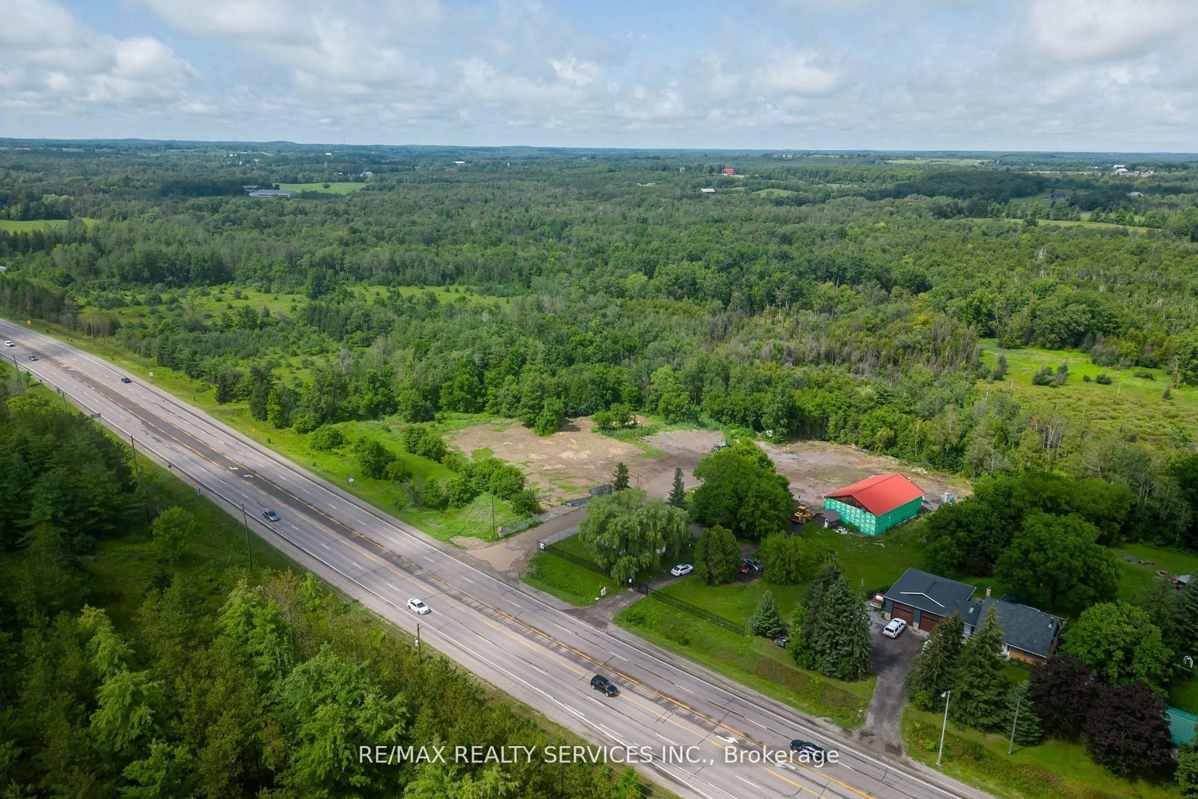 A pic from outside/outdoor area/front of a property/back of a property/a pic from drone, forest/trees view for 2178 Highway 6, Hamilton Ontario N0B 2J0