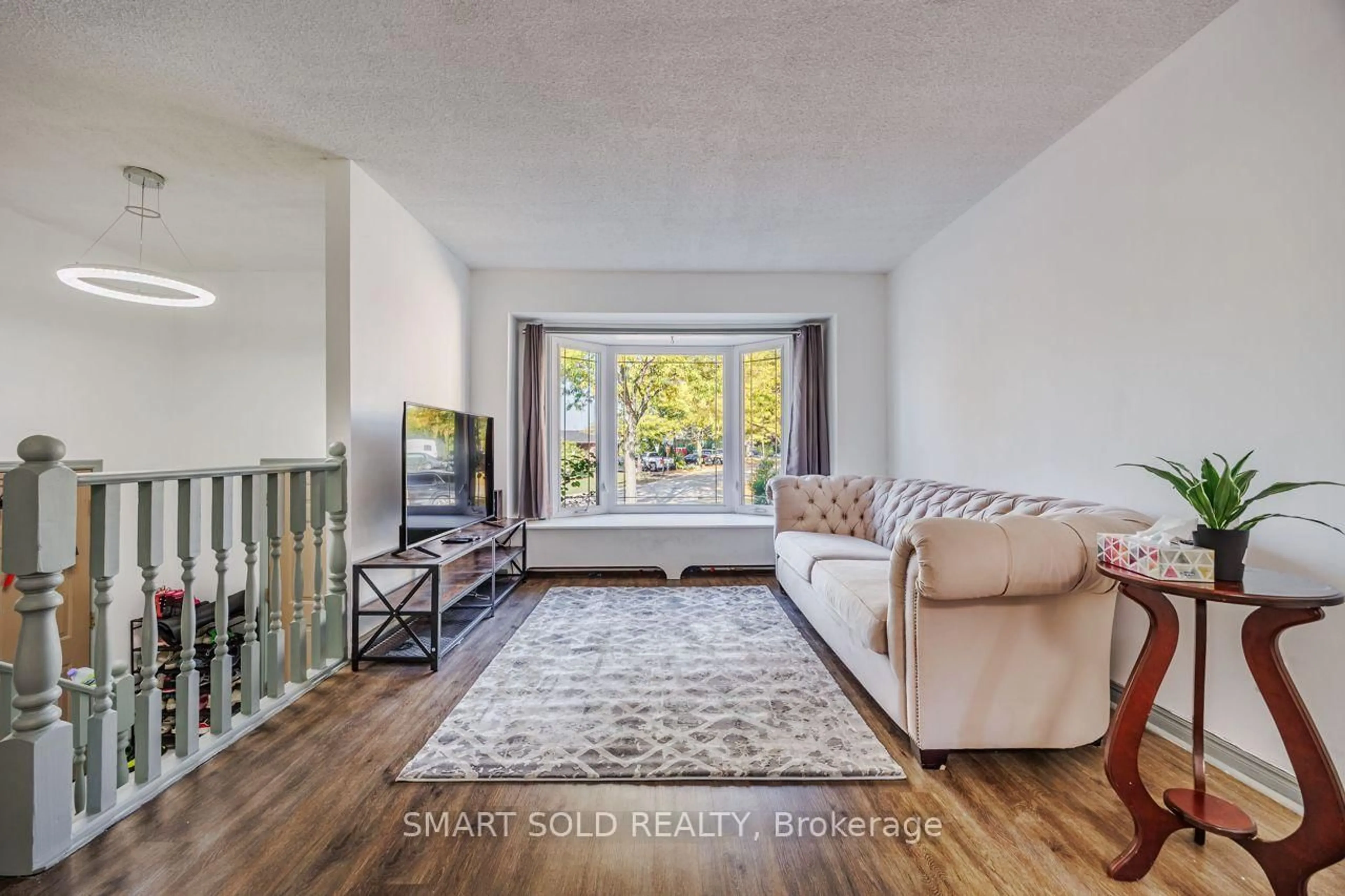 Living room with furniture, unknown for 44 Hemlock St, St. Catharines Ontario L2T 4B7