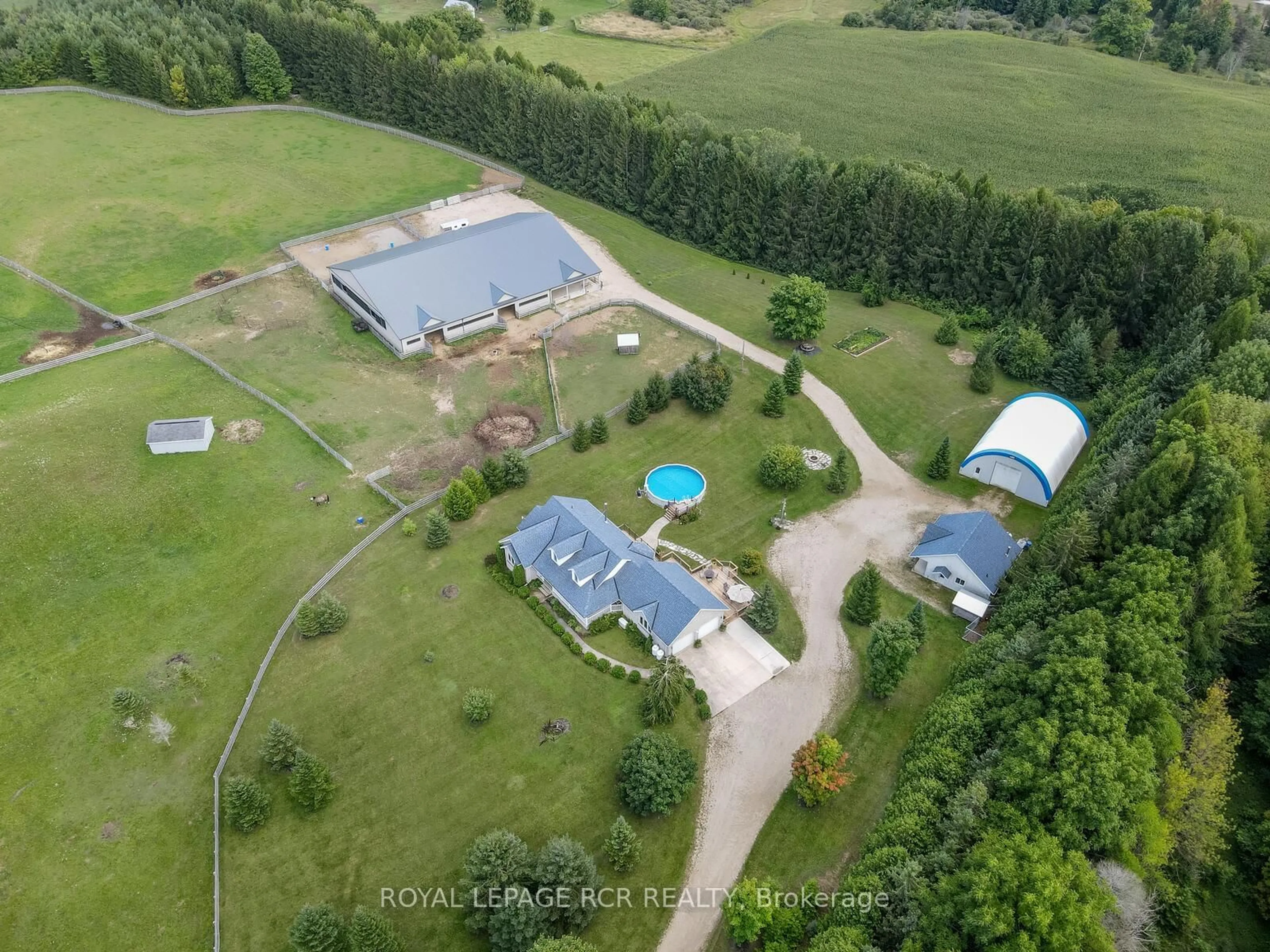 A pic from outside/outdoor area/front of a property/back of a property/a pic from drone, building for 102554 Road 49 Rd, West Grey Ontario N0G 1C0