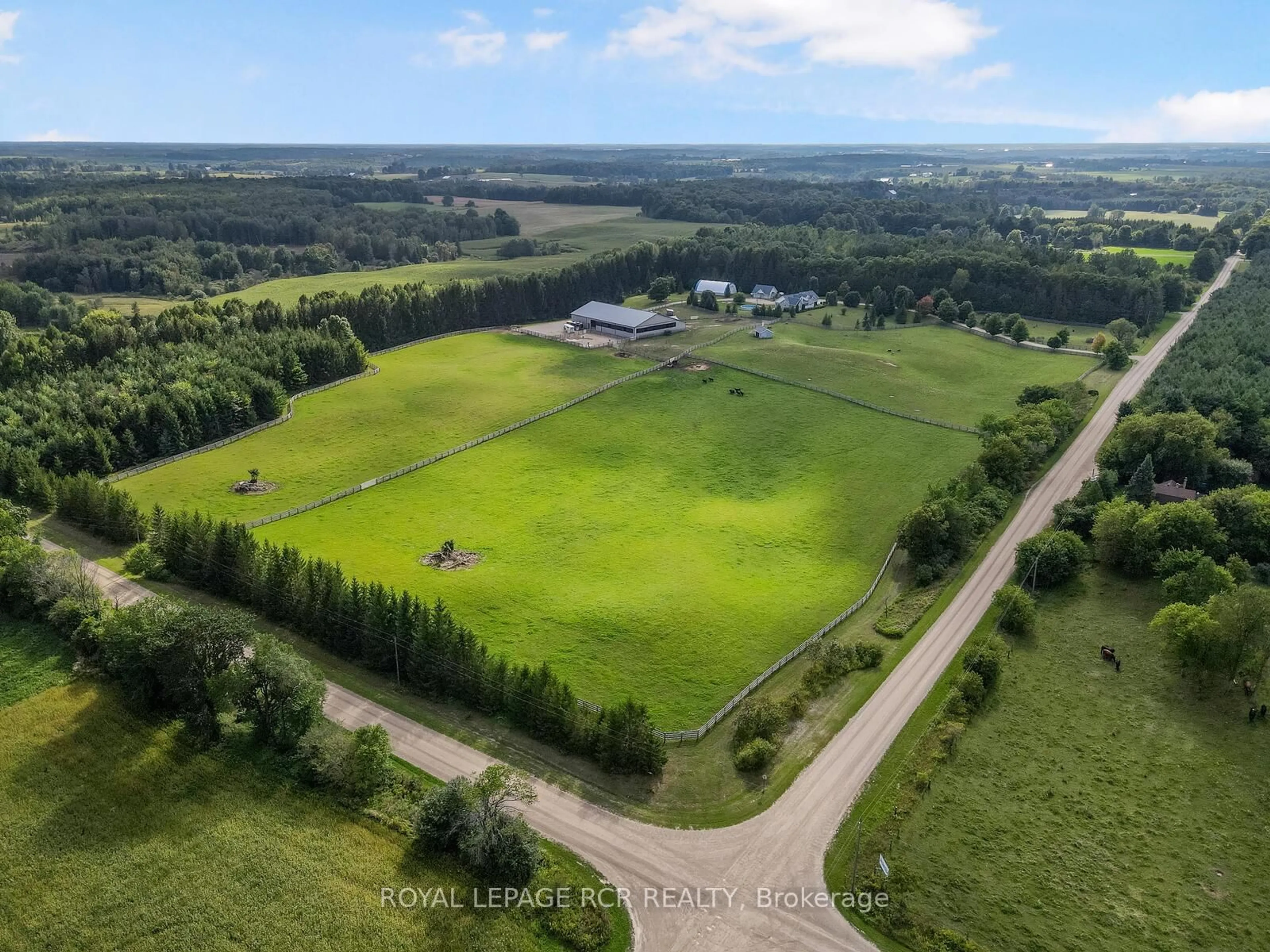 A pic from outside/outdoor area/front of a property/back of a property/a pic from drone, unknown for 102554 Road 49 Rd, West Grey Ontario N0G 1C0