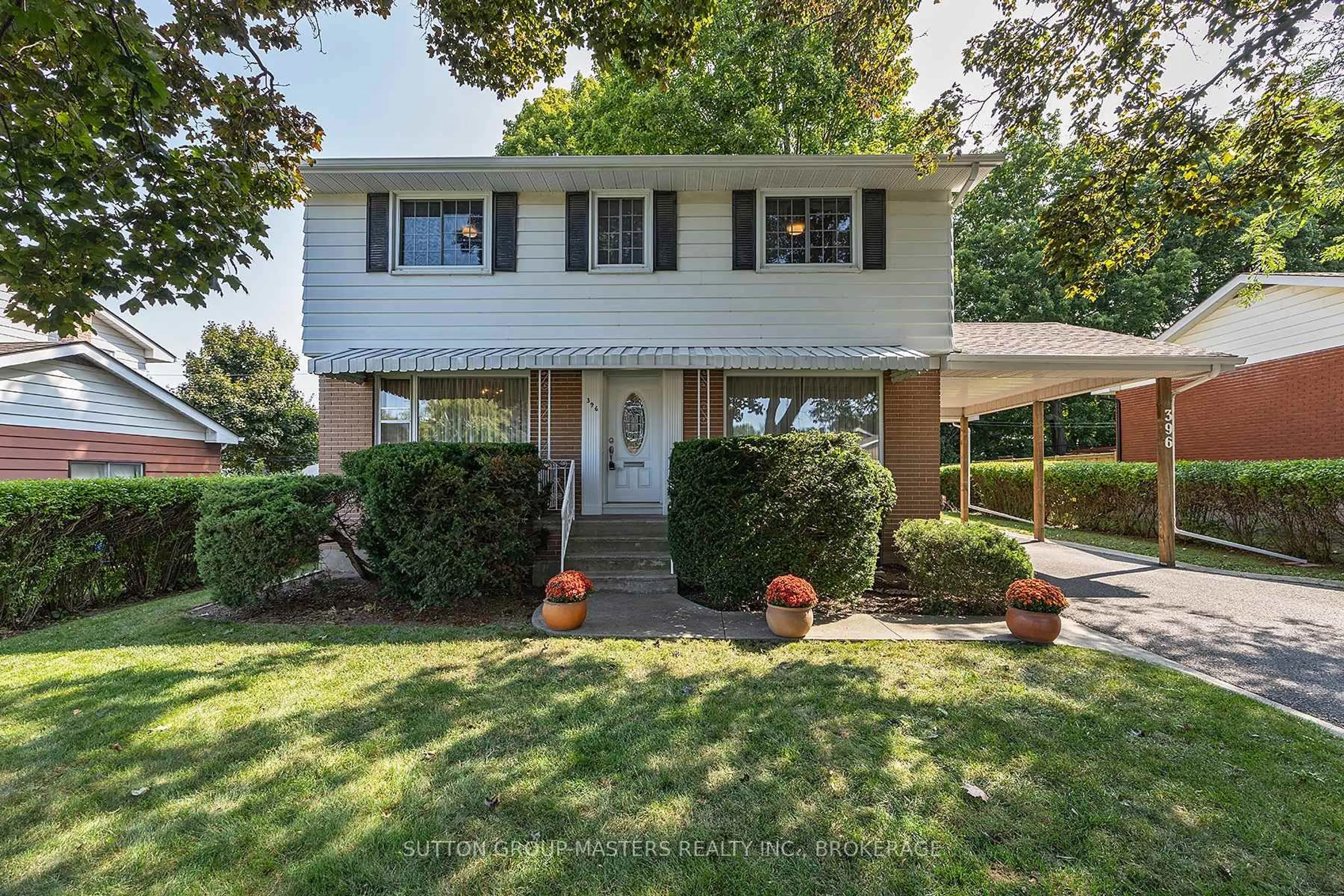 Home with vinyl exterior material, street for 396 Roosevelt Dr, Kingston Ontario K7M 4A7