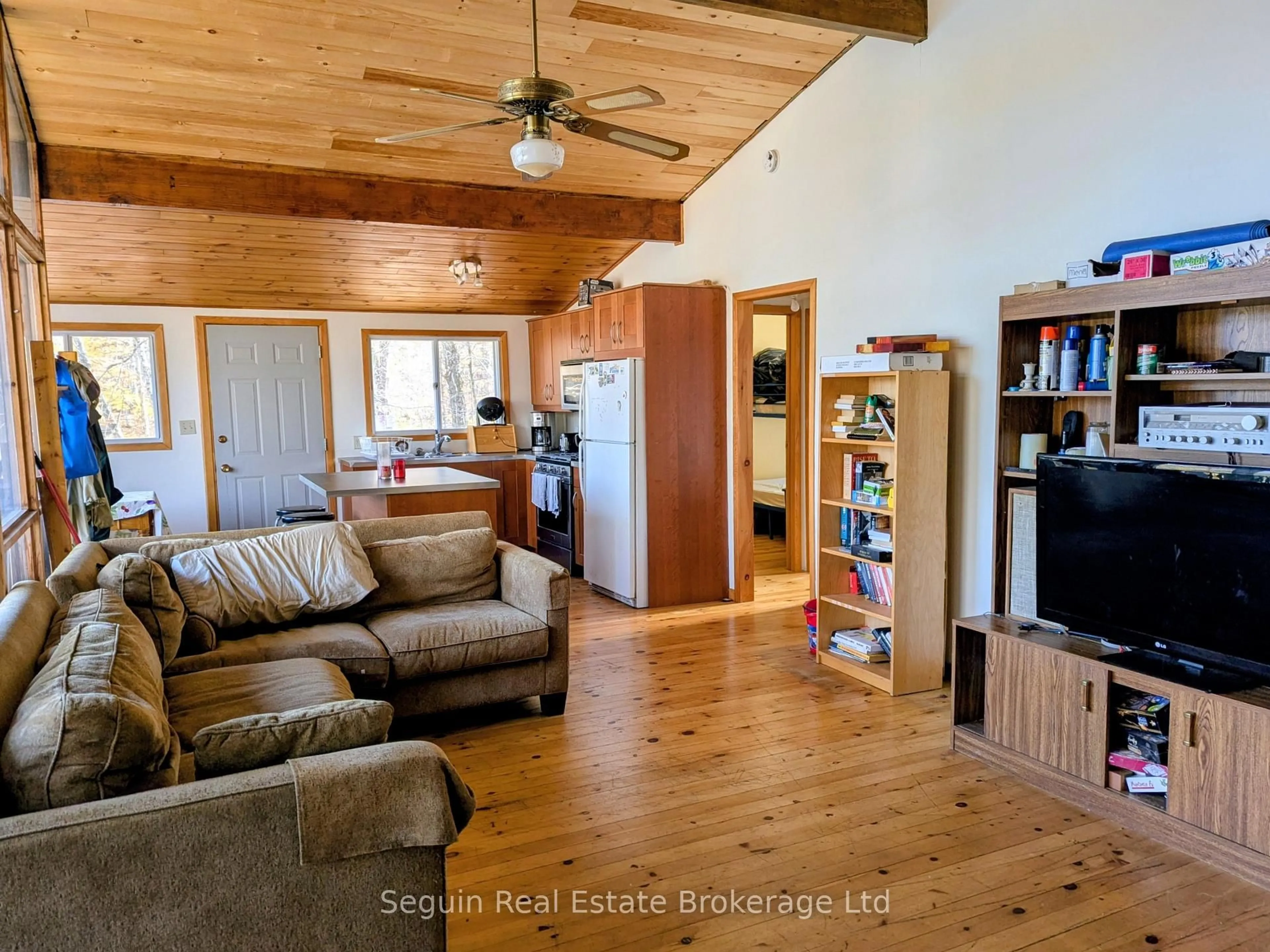 Living room with furniture, wood/laminate floor for 35 Lower Fry's Rd, McMurrich/Monteith Ontario P2A 0B6