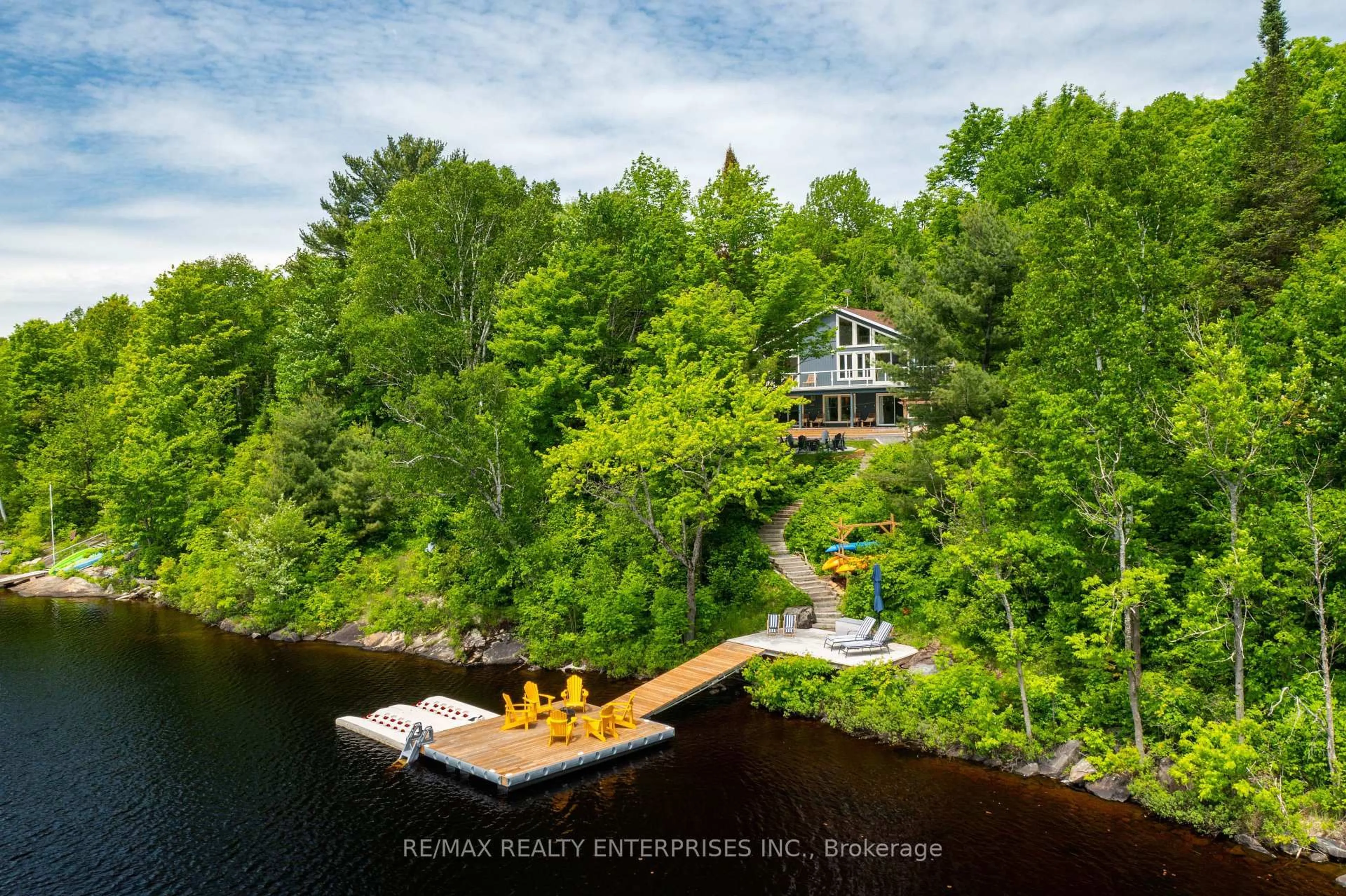 A pic from outside/outdoor area/front of a property/back of a property/a pic from drone, water/lake/river/ocean view for 140 Rachels Lane, Huntsville Ontario P1H 2J2