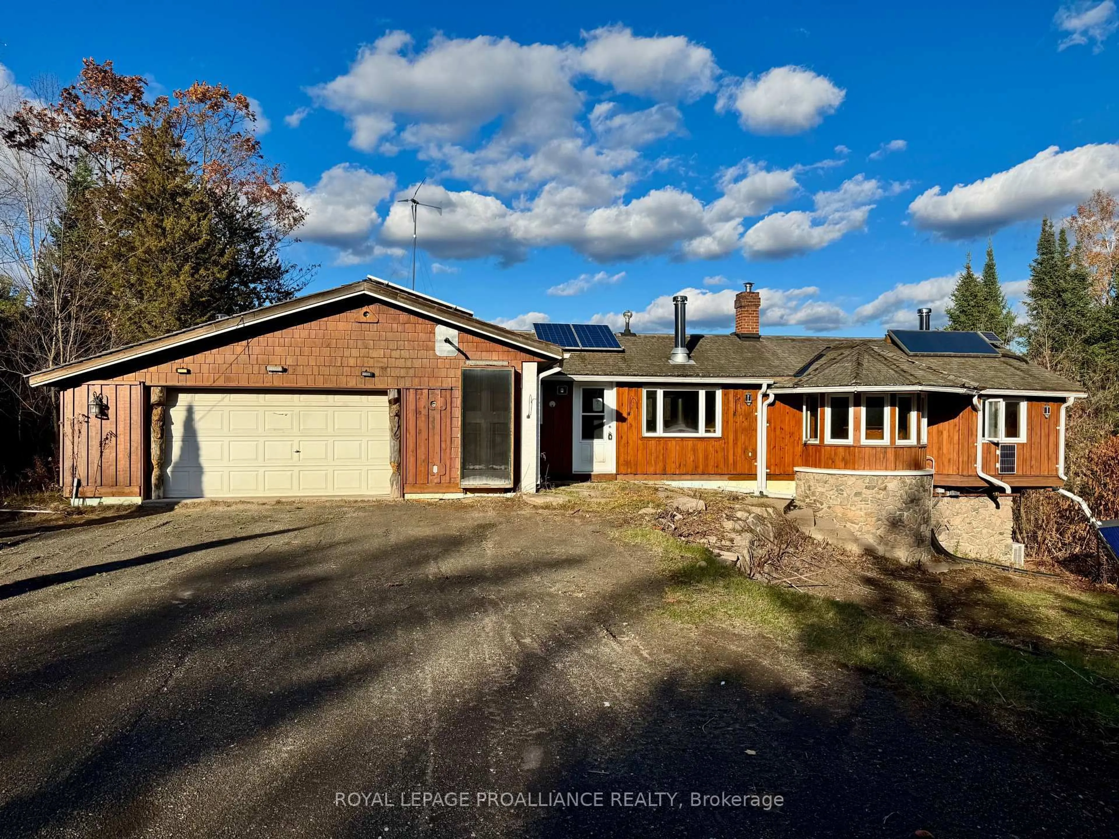 A pic from outside/outdoor area/front of a property/back of a property/a pic from drone, street for 412 McCauley's Rd, North Kawartha Ontario K0L 1A0
