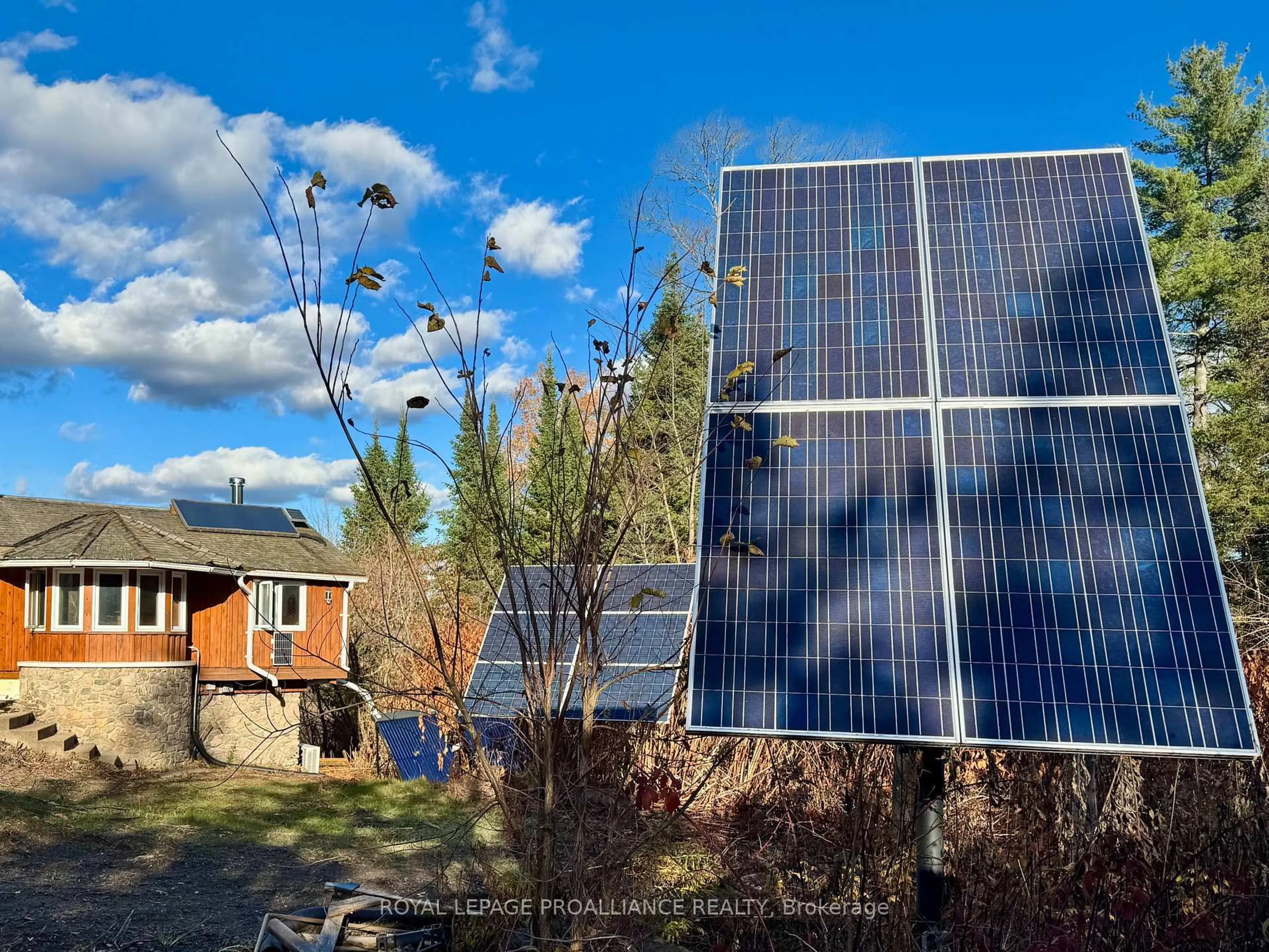 A pic from outside/outdoor area/front of a property/back of a property/a pic from drone, building for 412 McCauley's Rd, North Kawartha Ontario K0L 1A0