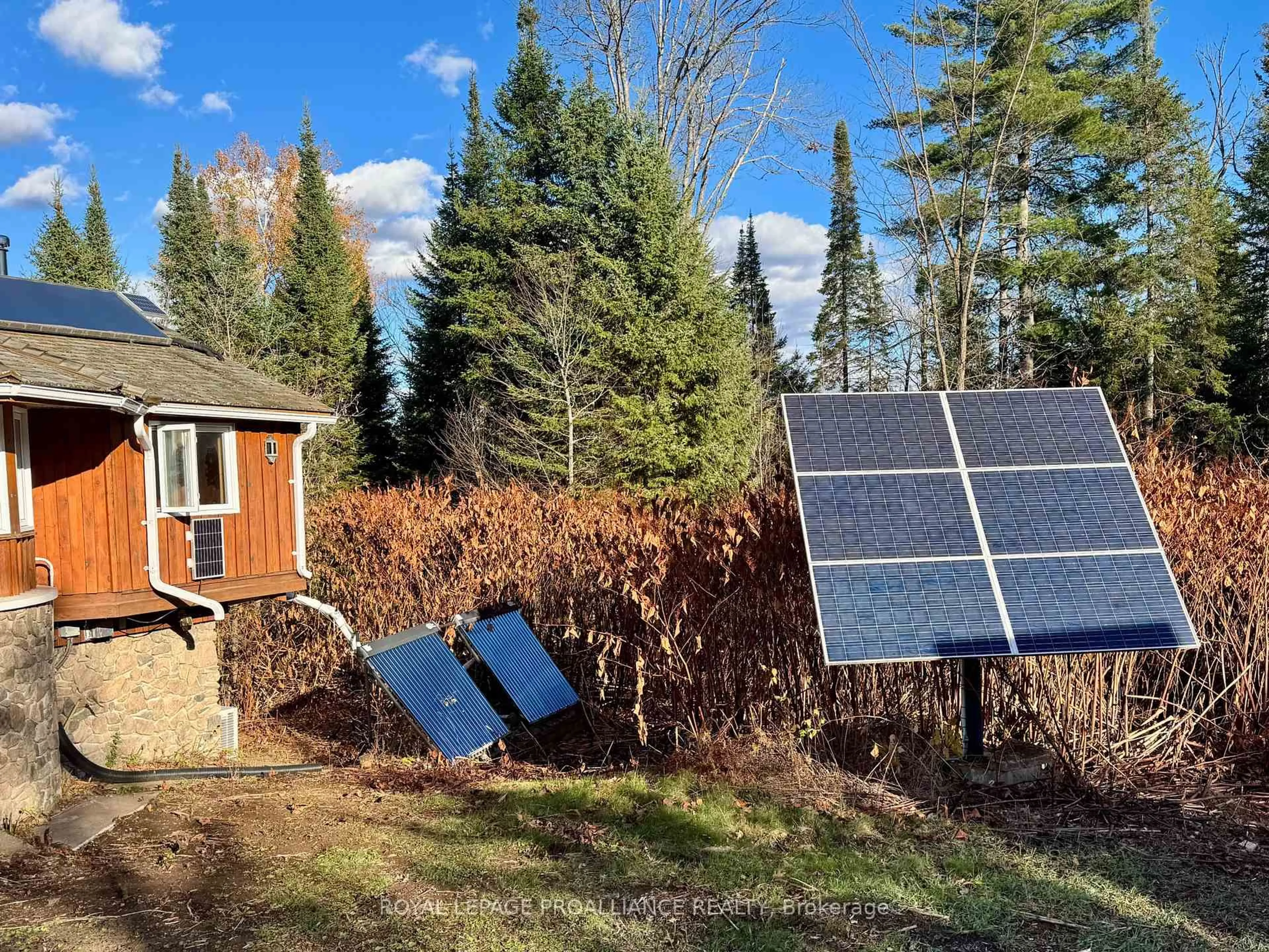 A pic from outside/outdoor area/front of a property/back of a property/a pic from drone, unknown for 412 McCauley's Rd, North Kawartha Ontario K0L 1A0