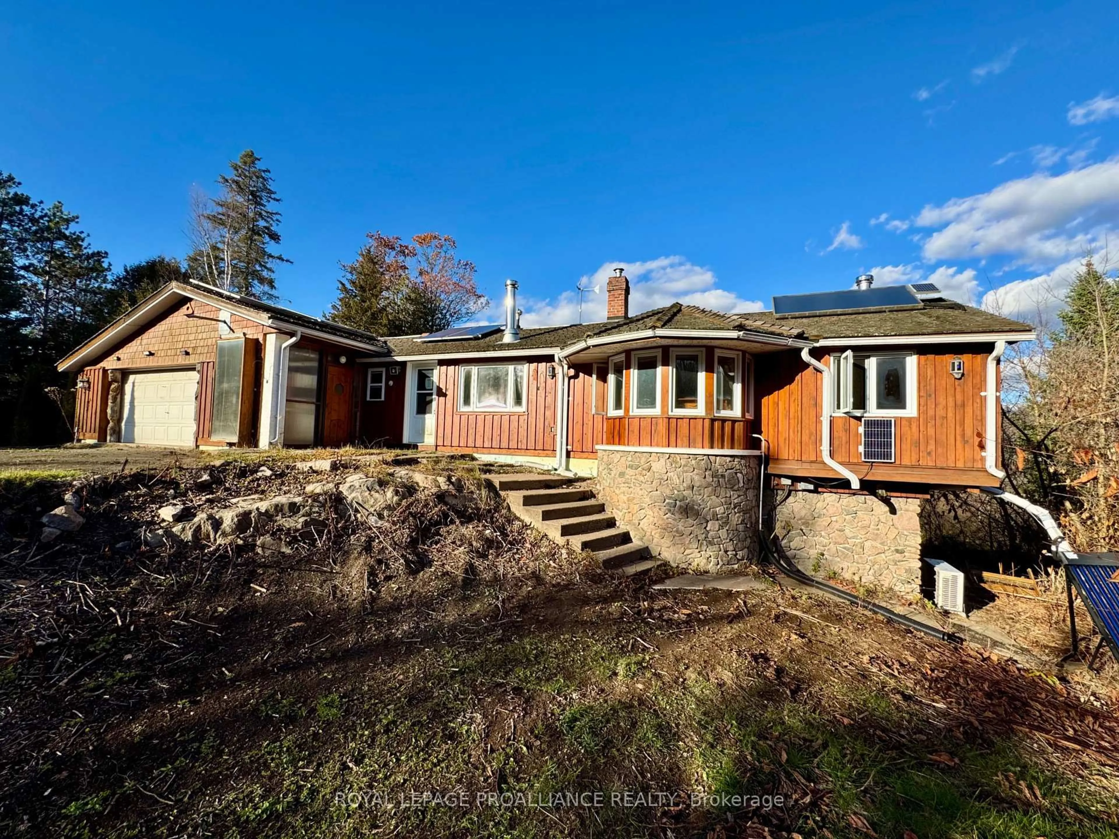 A pic from outside/outdoor area/front of a property/back of a property/a pic from drone, street for 412 McCauley's Rd, North Kawartha Ontario K0L 1A0