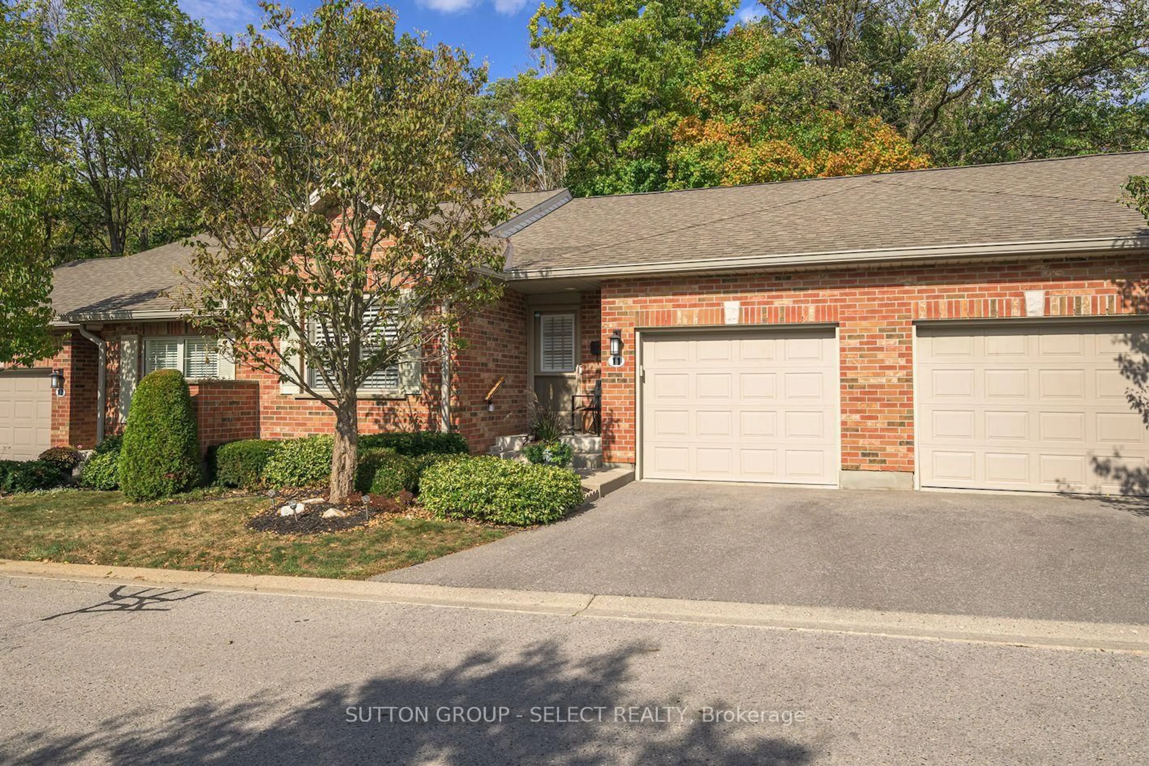 Home with brick exterior material, street for 1337 Commissioners Rd #11, London South Ontario N6K 4V2
