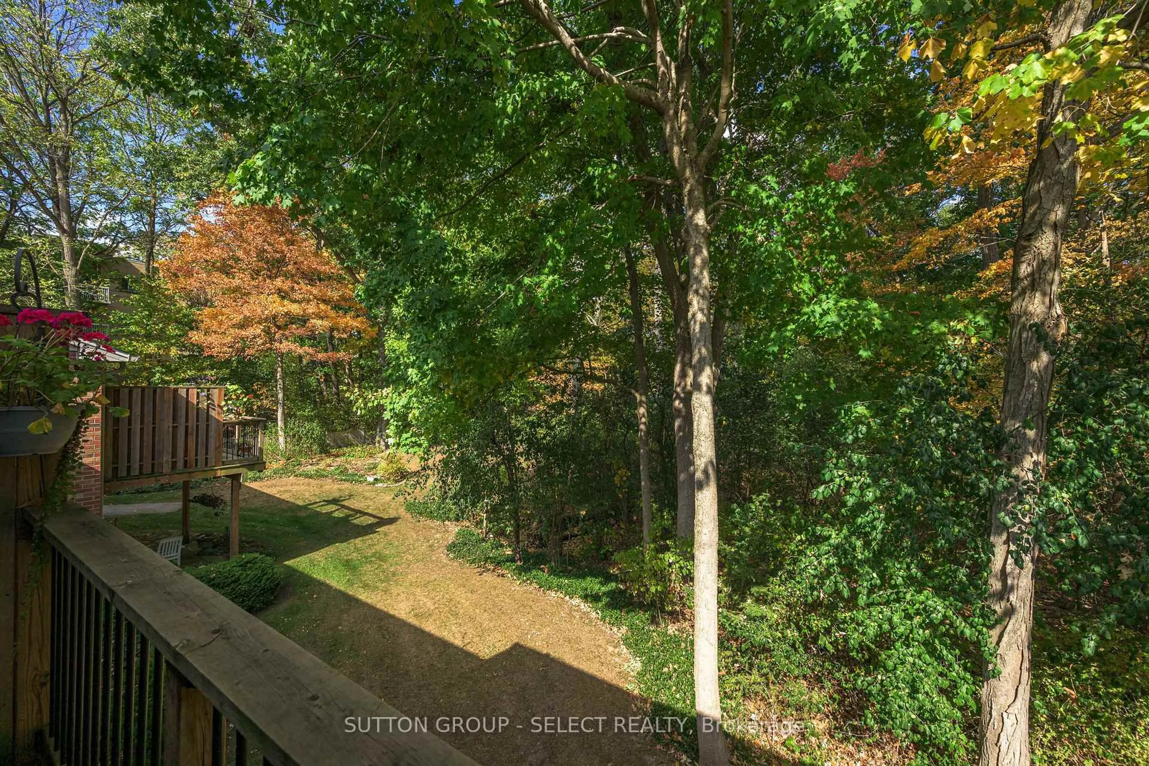 A pic from outside/outdoor area/front of a property/back of a property/a pic from drone, forest/trees view for 1337 Commissioners Rd #11, London South Ontario N6K 4V2