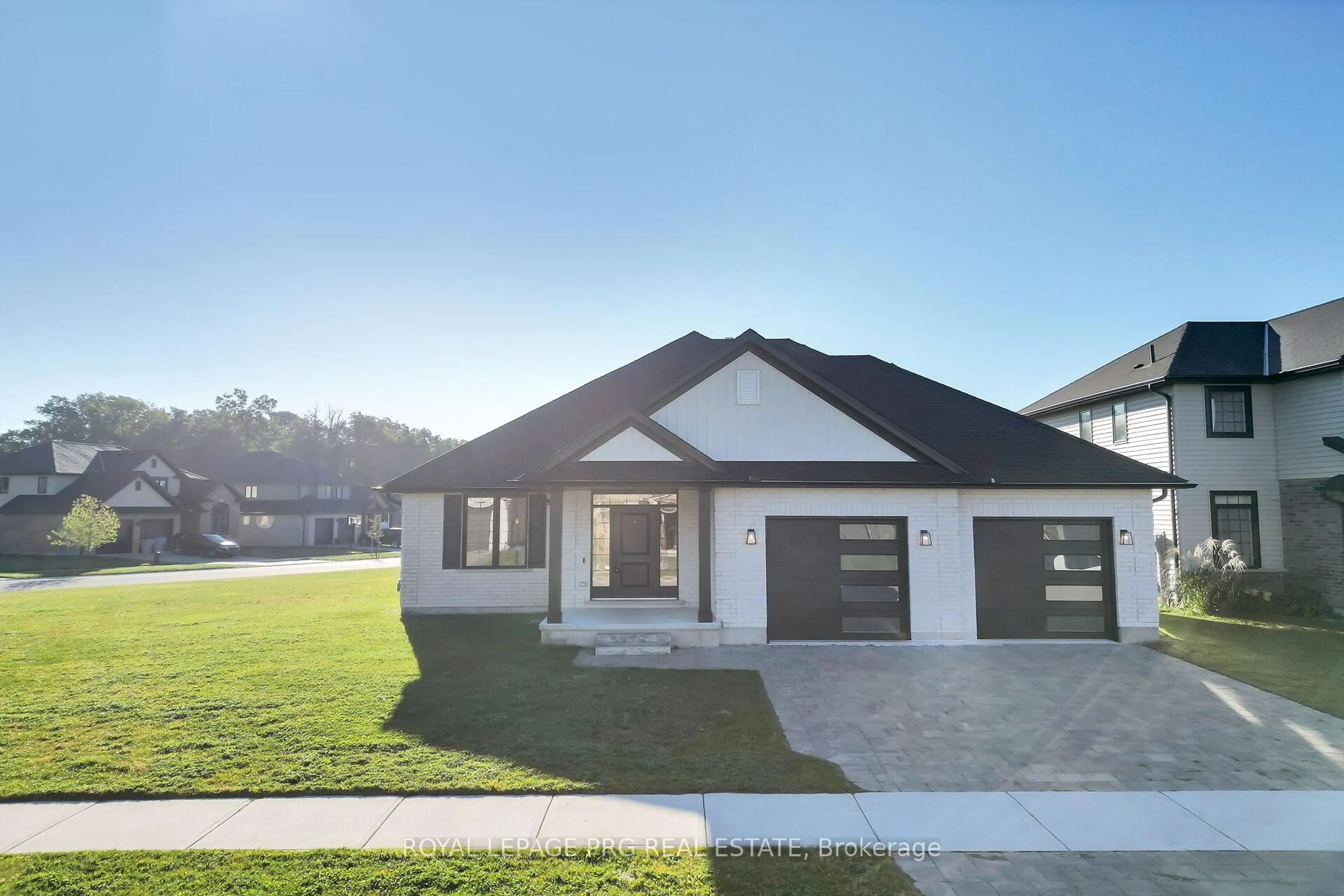 Home with vinyl exterior material, street for 649 Tull St, Strathroy-Caradoc Ontario N0L 1W0