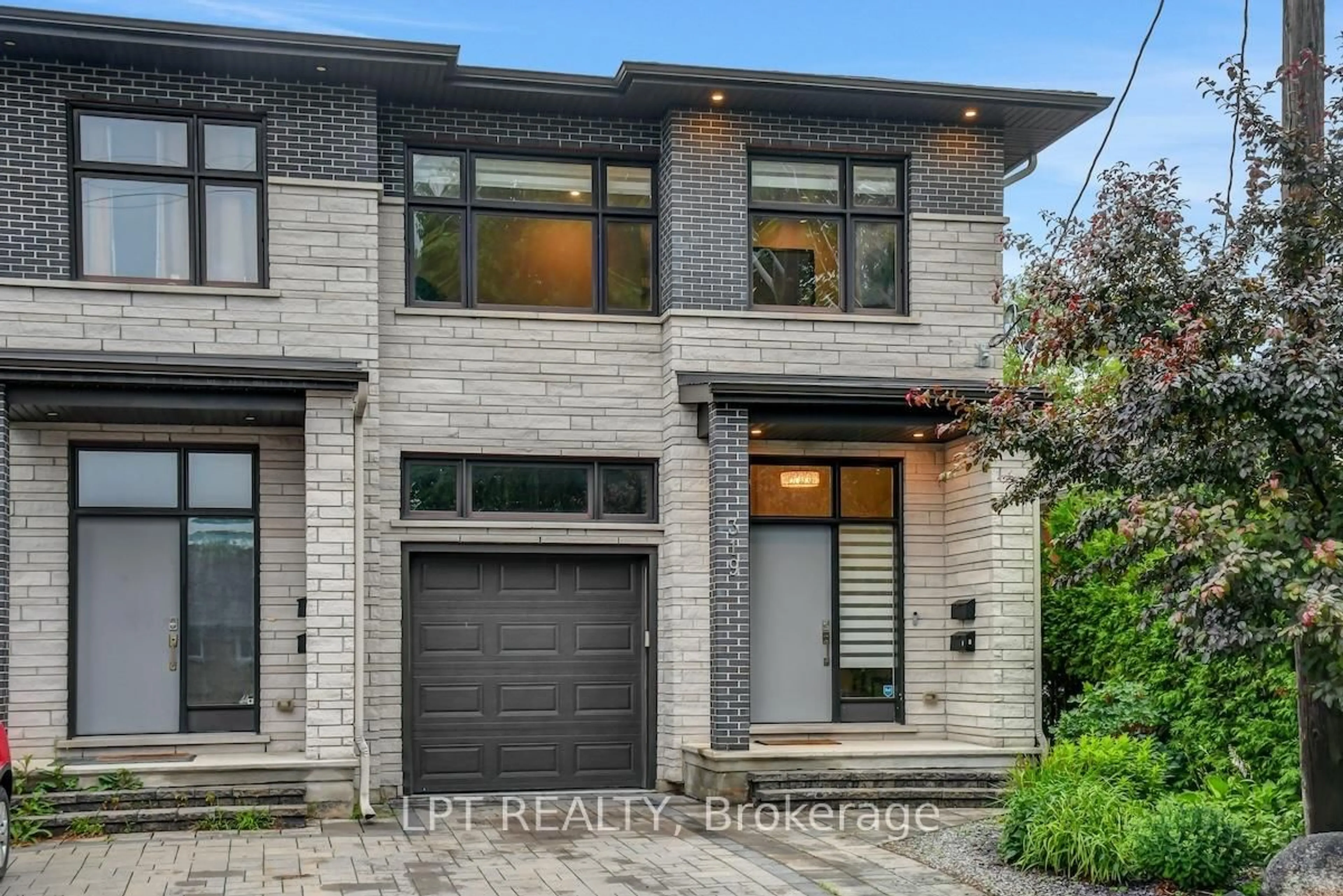 Home with brick exterior material, street for 319 Glynn Ave, Ottawa Ontario K1K 1R9