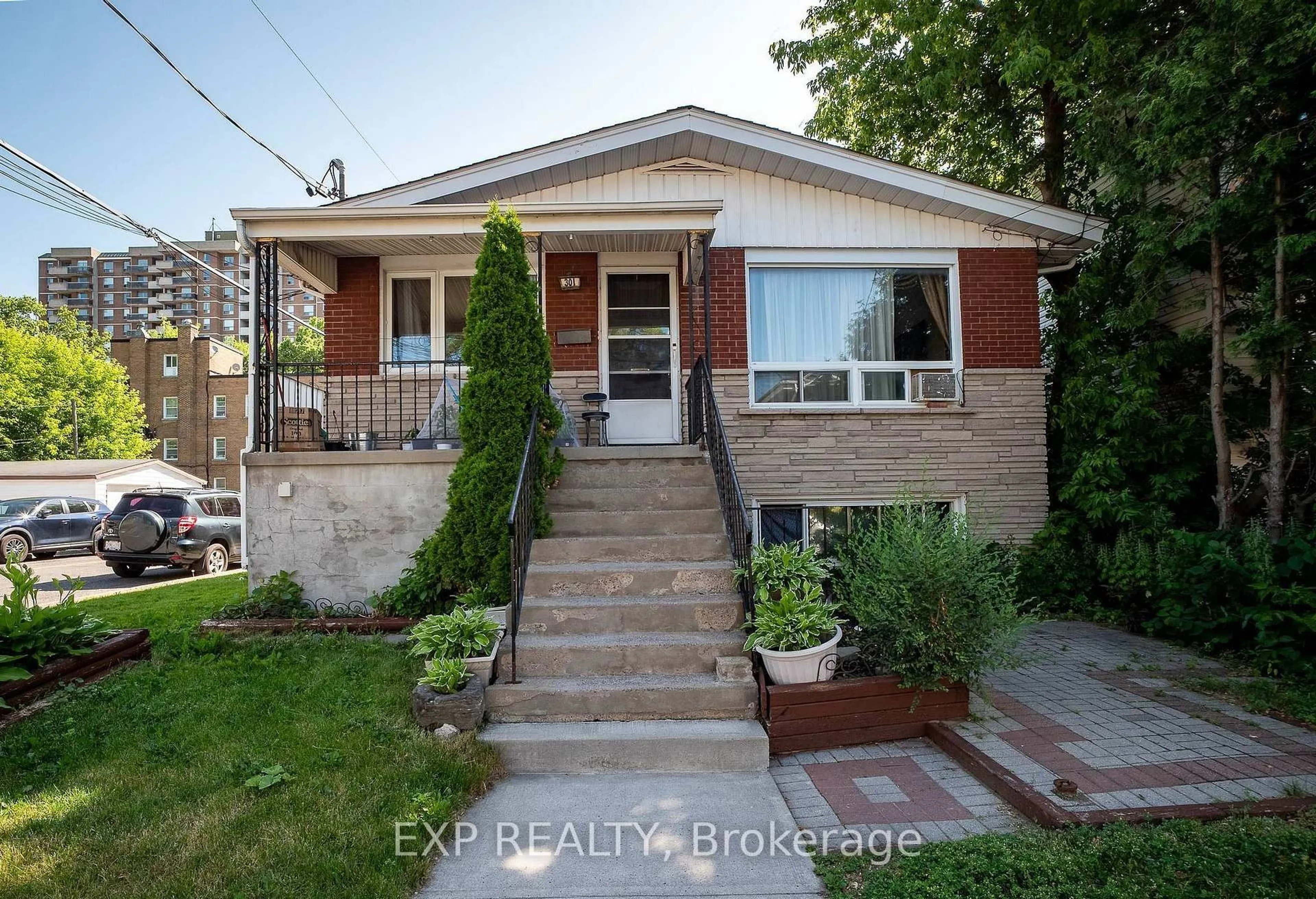 Home with brick exterior material, street for 310 Patton St, Ottawa Ontario K1L 6G4
