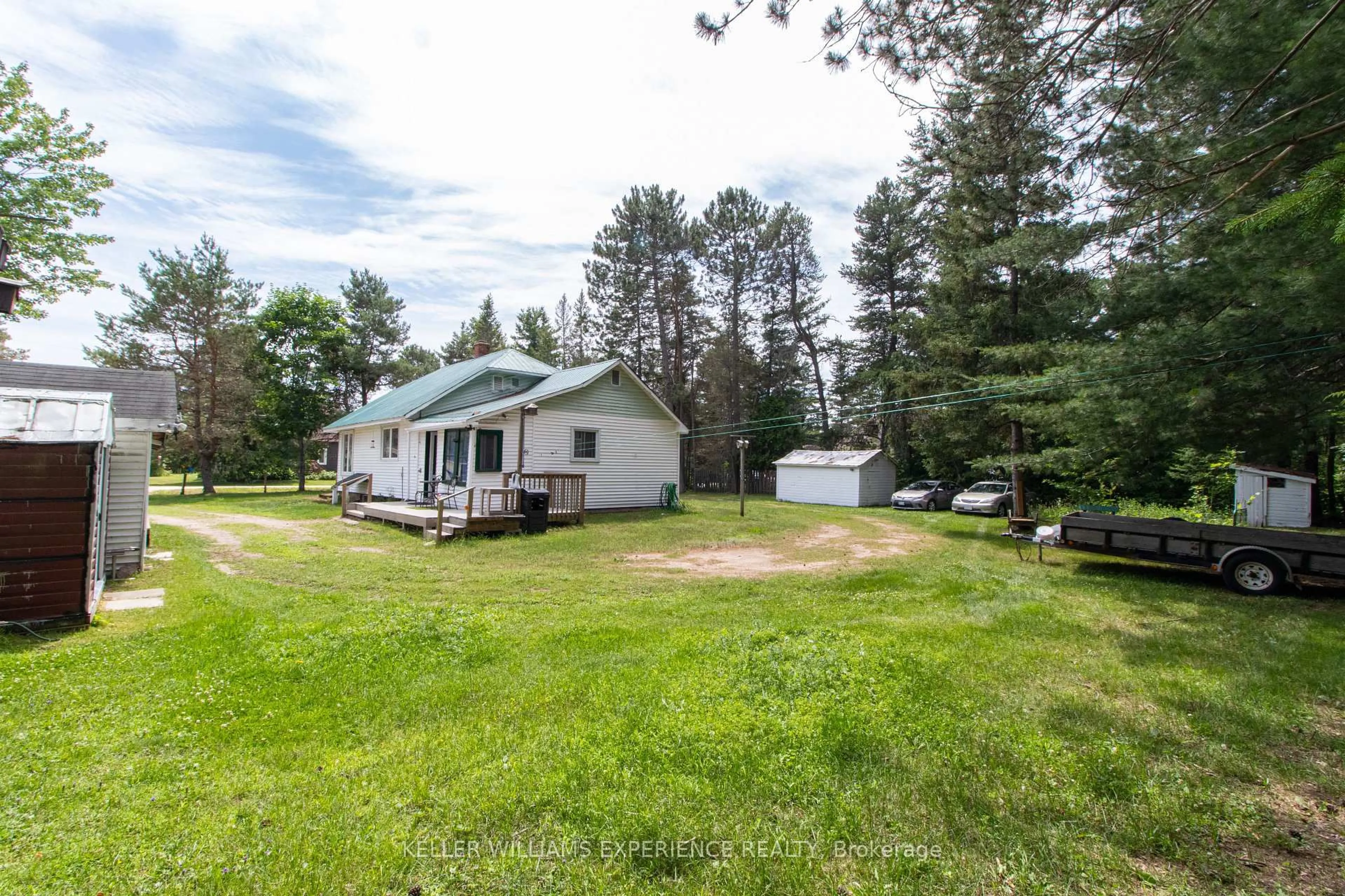 A pic from outside/outdoor area/front of a property/back of a property/a pic from drone, unknown for 152 Ottawa Ave, South River Ontario P0A 1X0