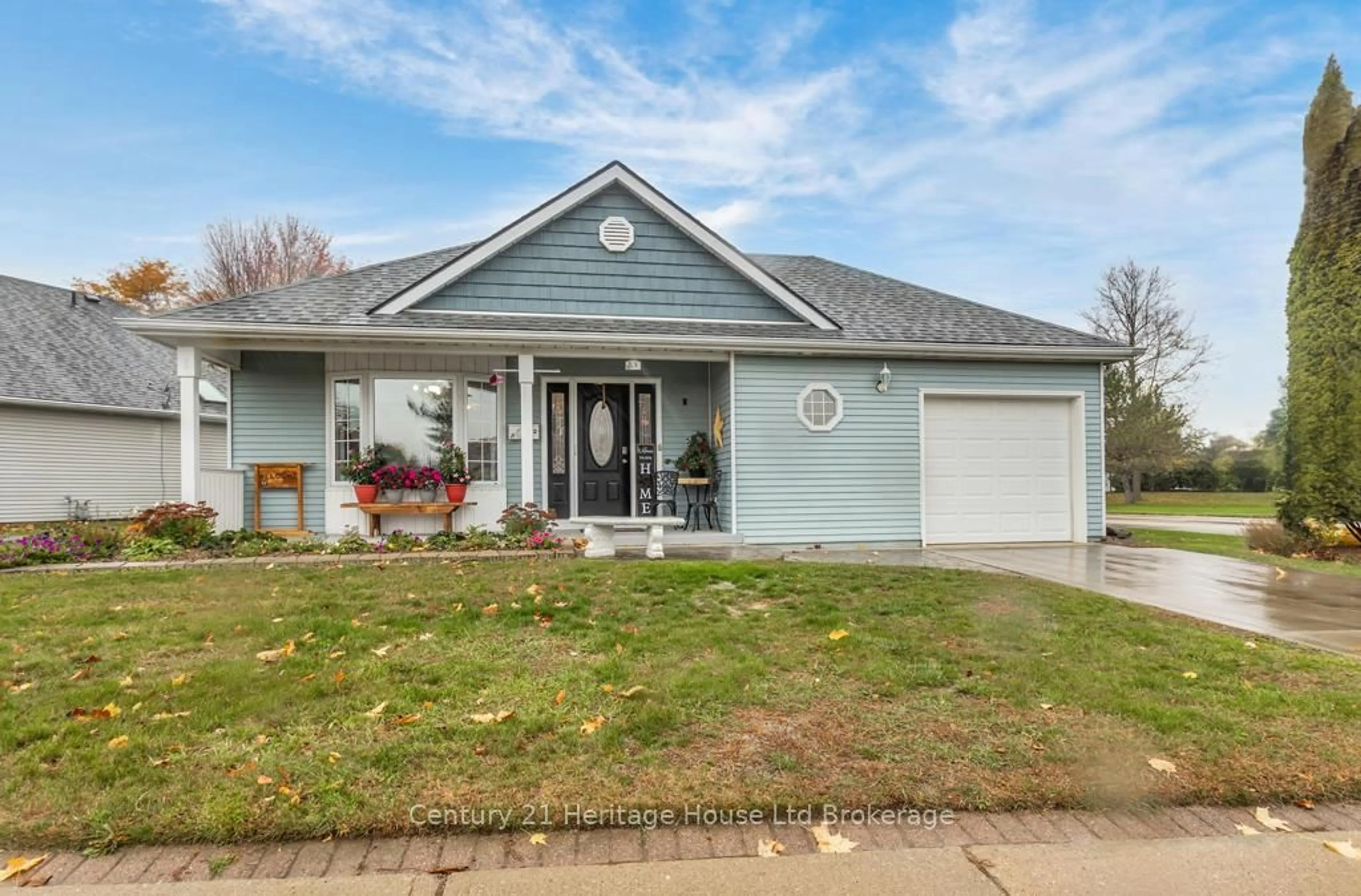 Home with vinyl exterior material, street for 5 Dereham Dr, Tillsonburg Ontario N4G 5L8